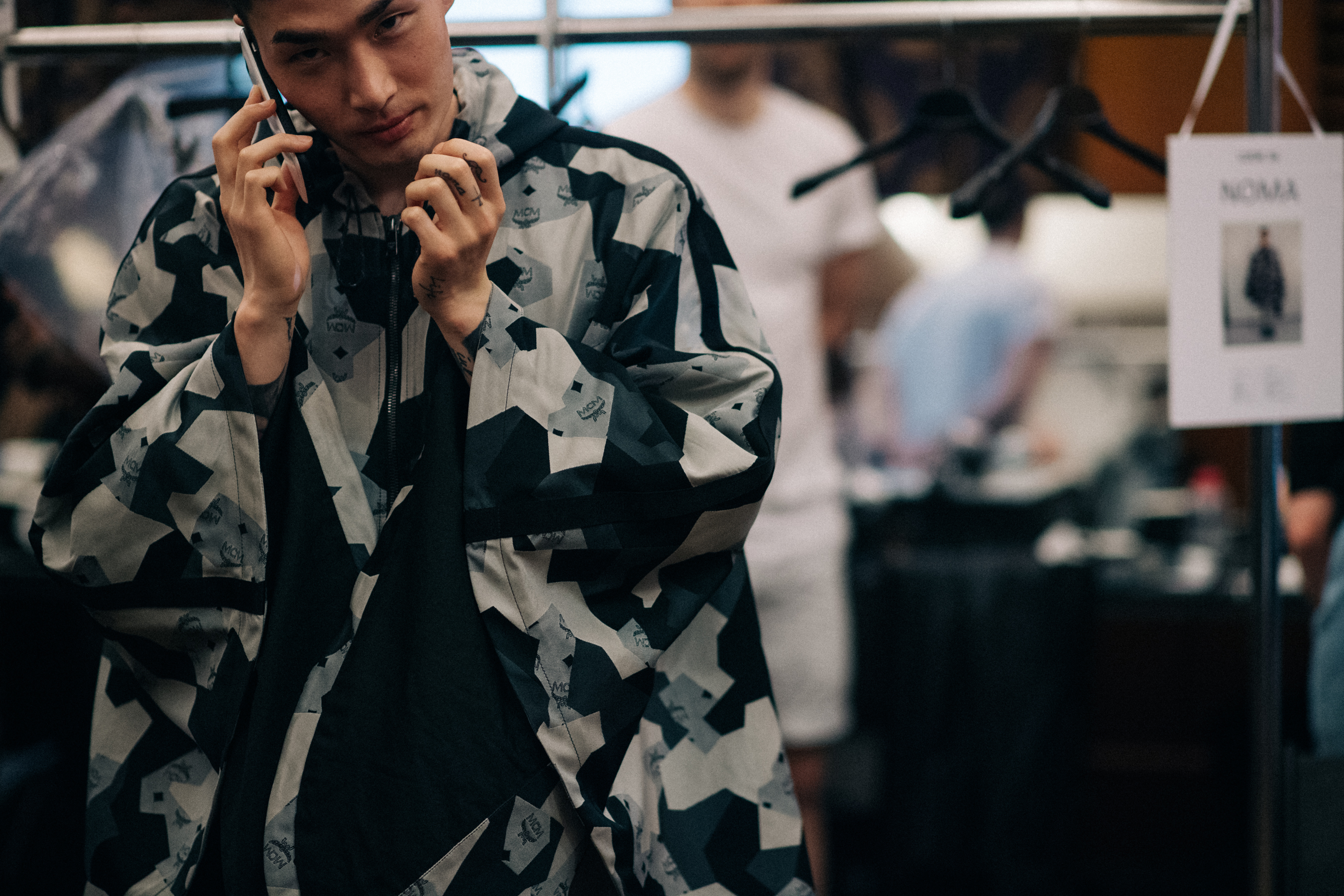 Male model talking on the phone