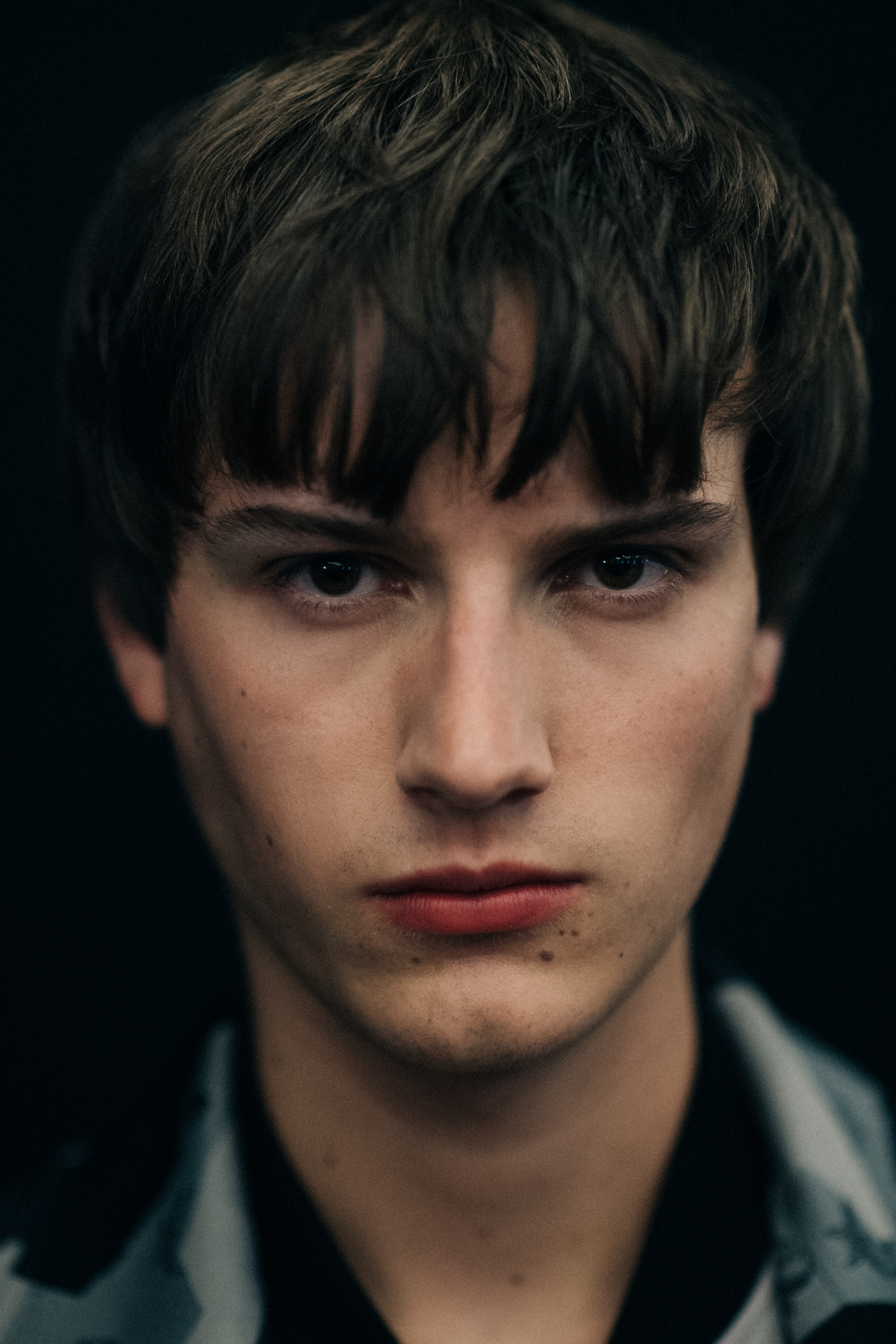 Male model with brown eyes posing