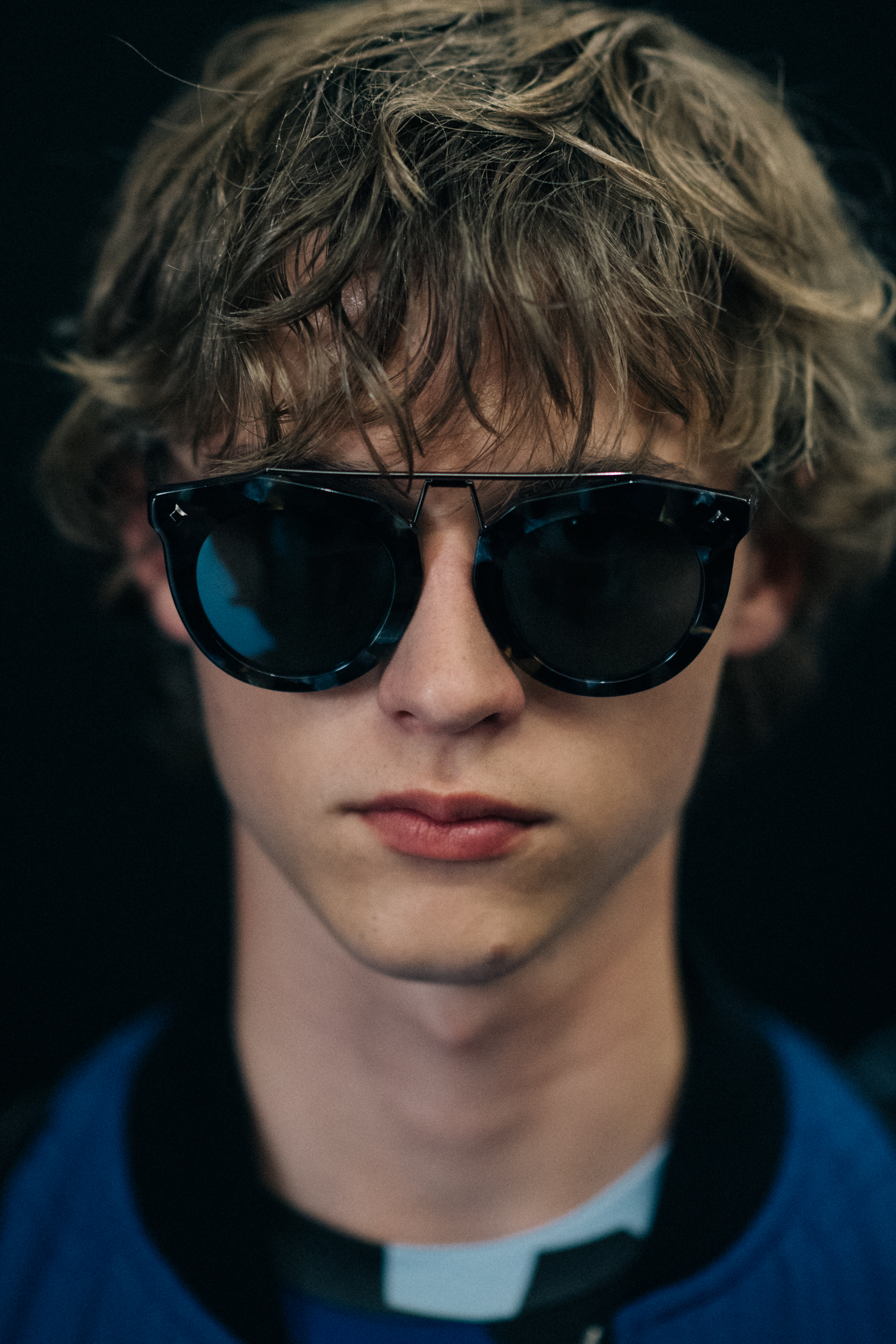 Male model posing in sunglasses