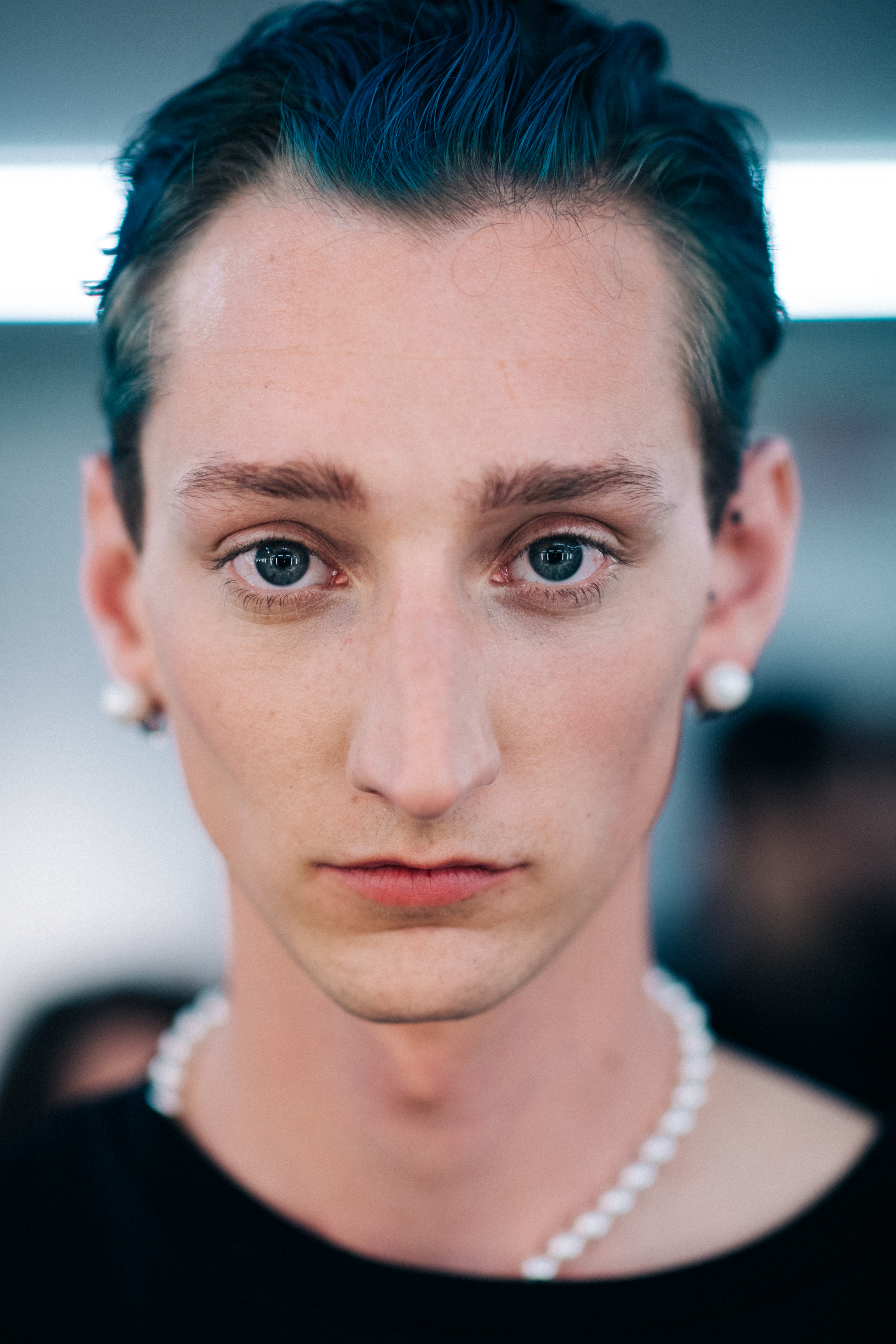 Portrait of a blue-eyed young man