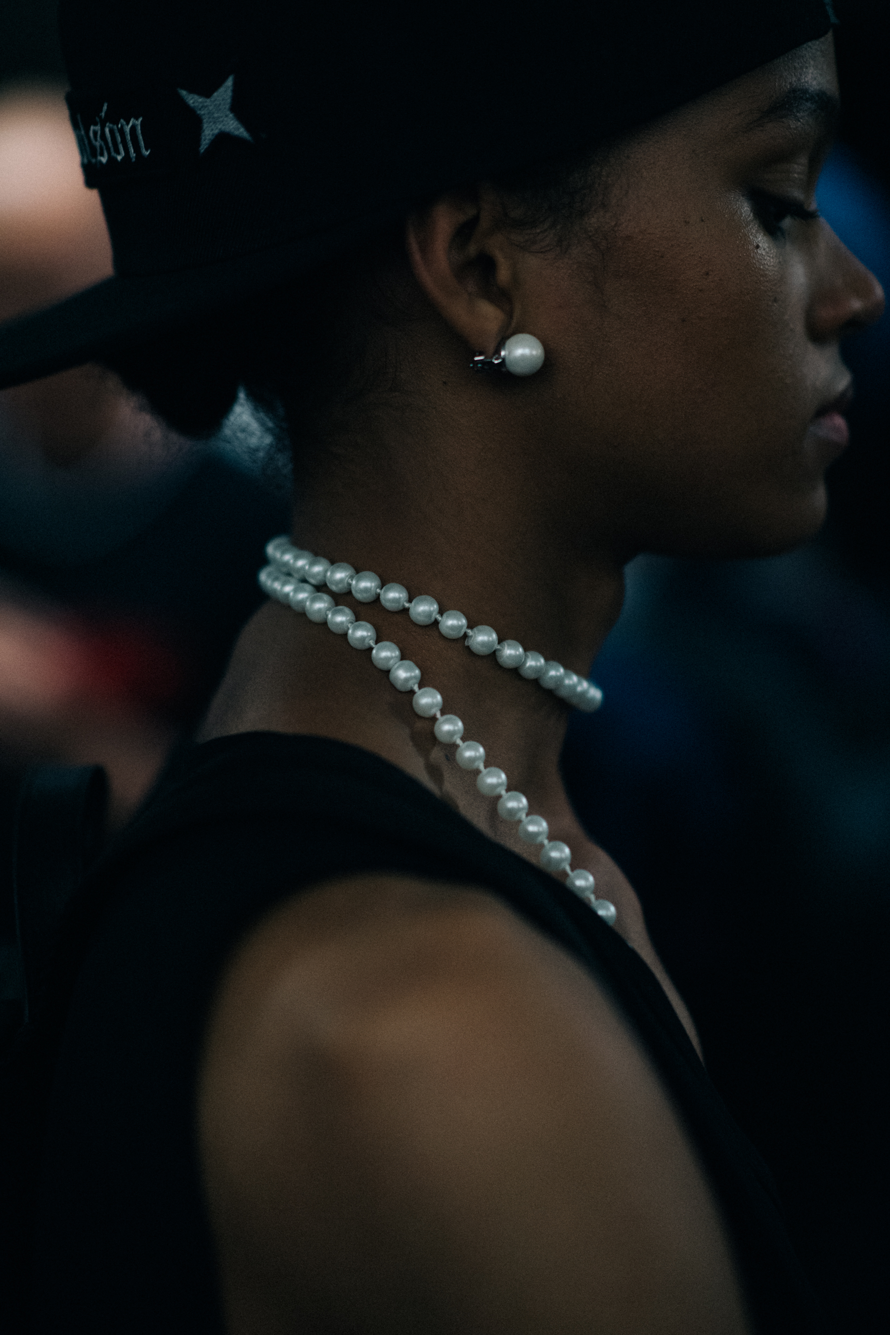 A model in black with white pearls