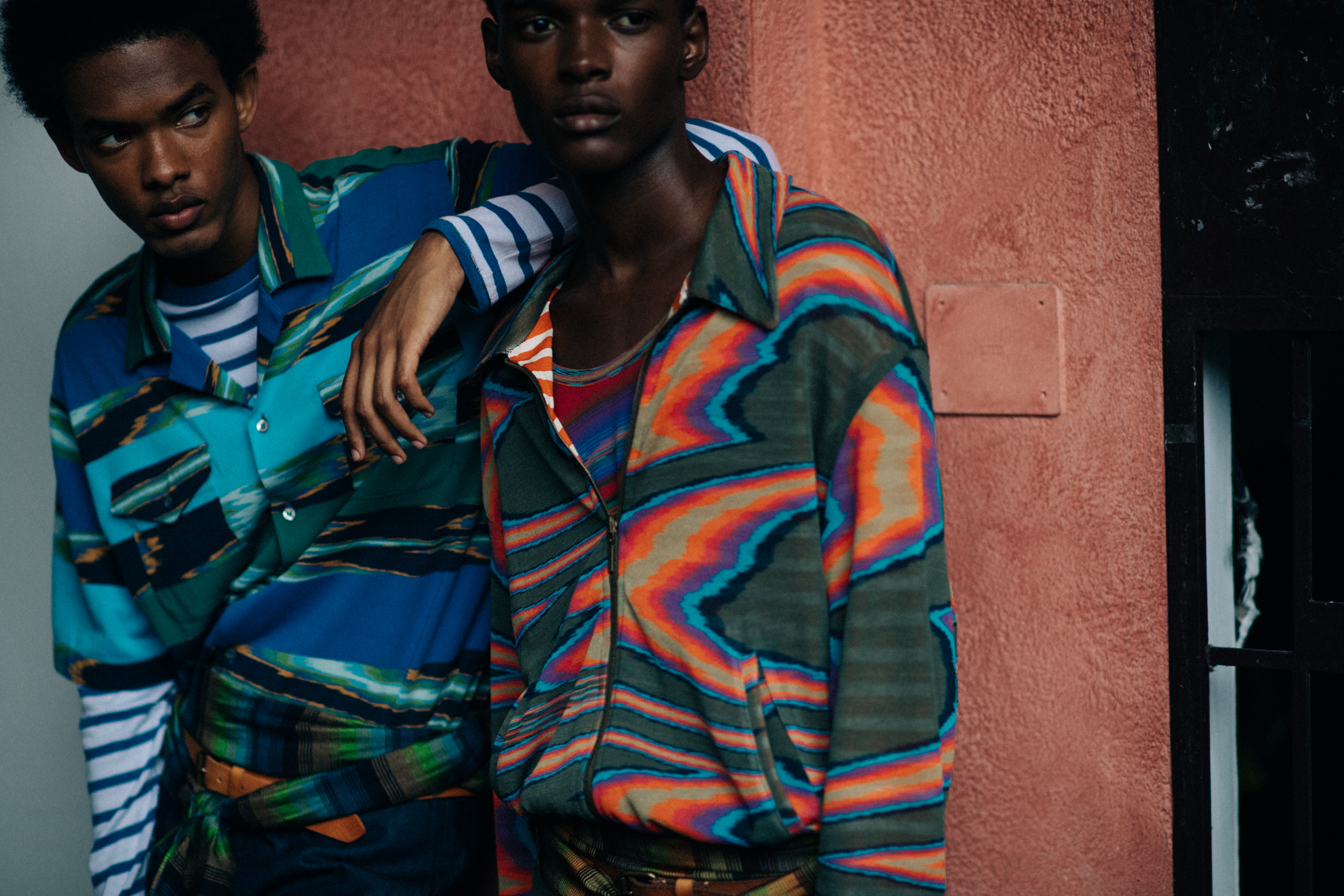 Male models in bright colourful tops
