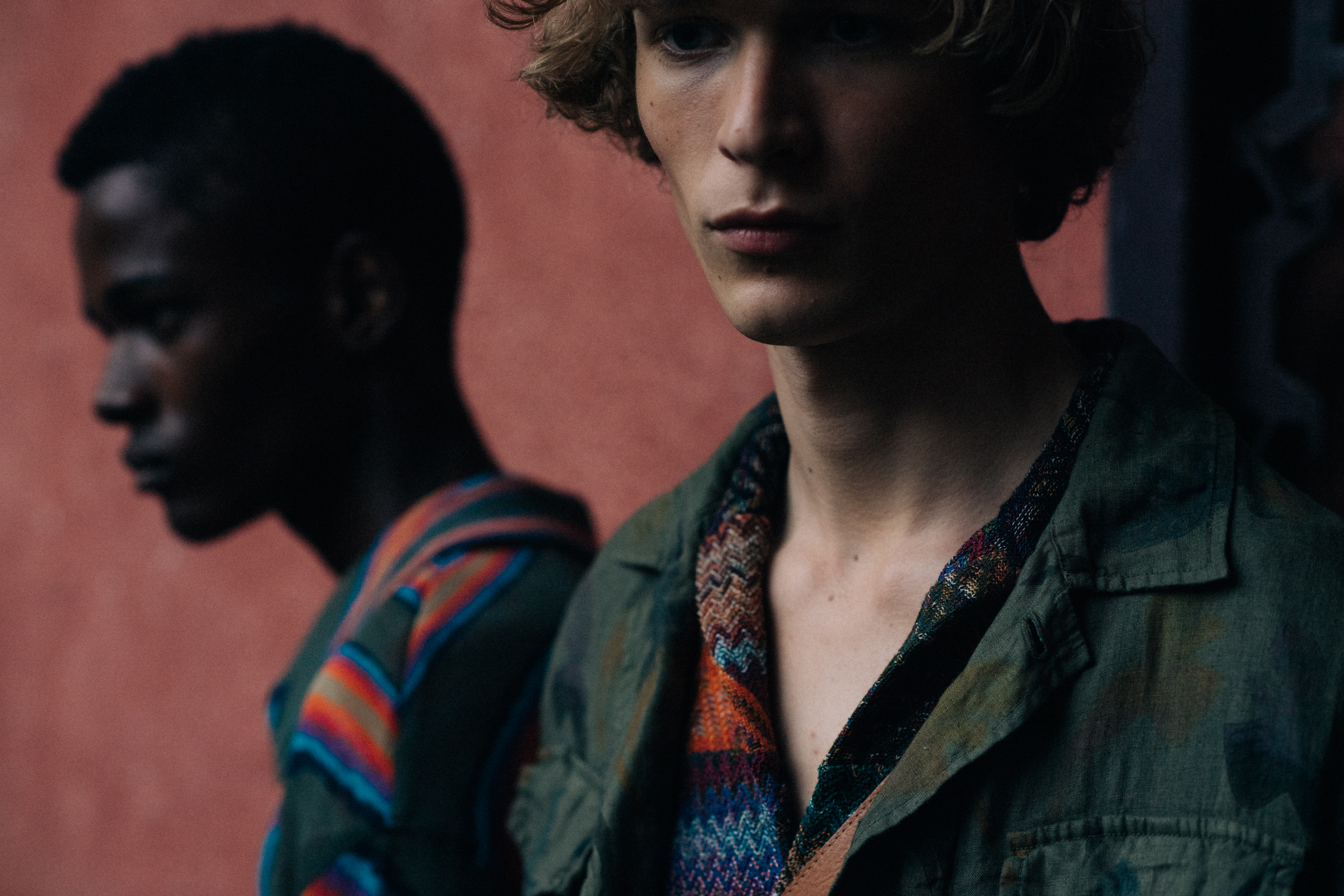 Male models in colourful outfits
