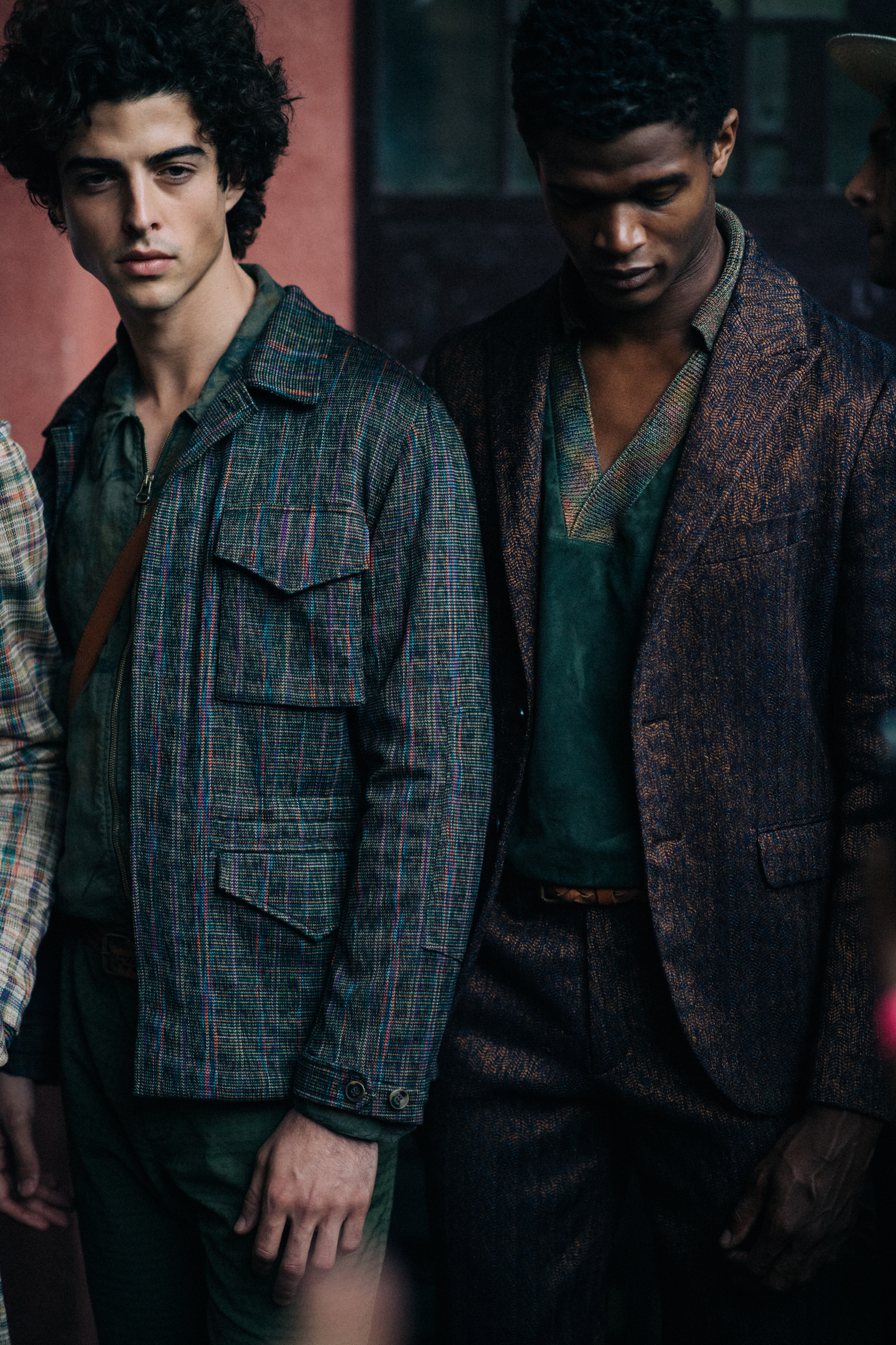 Models wearing suits and posing