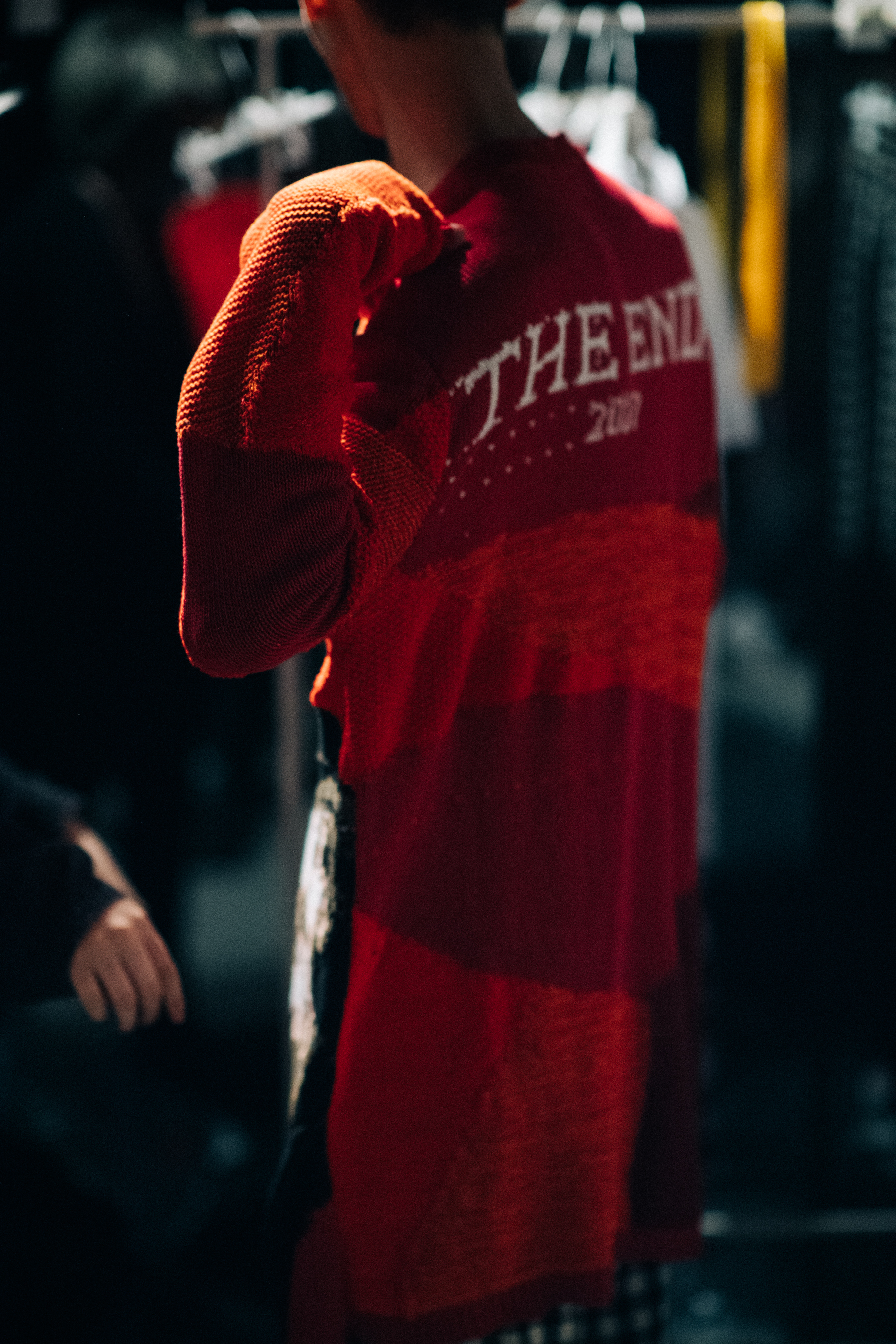 Male model wearing red T-Shirt