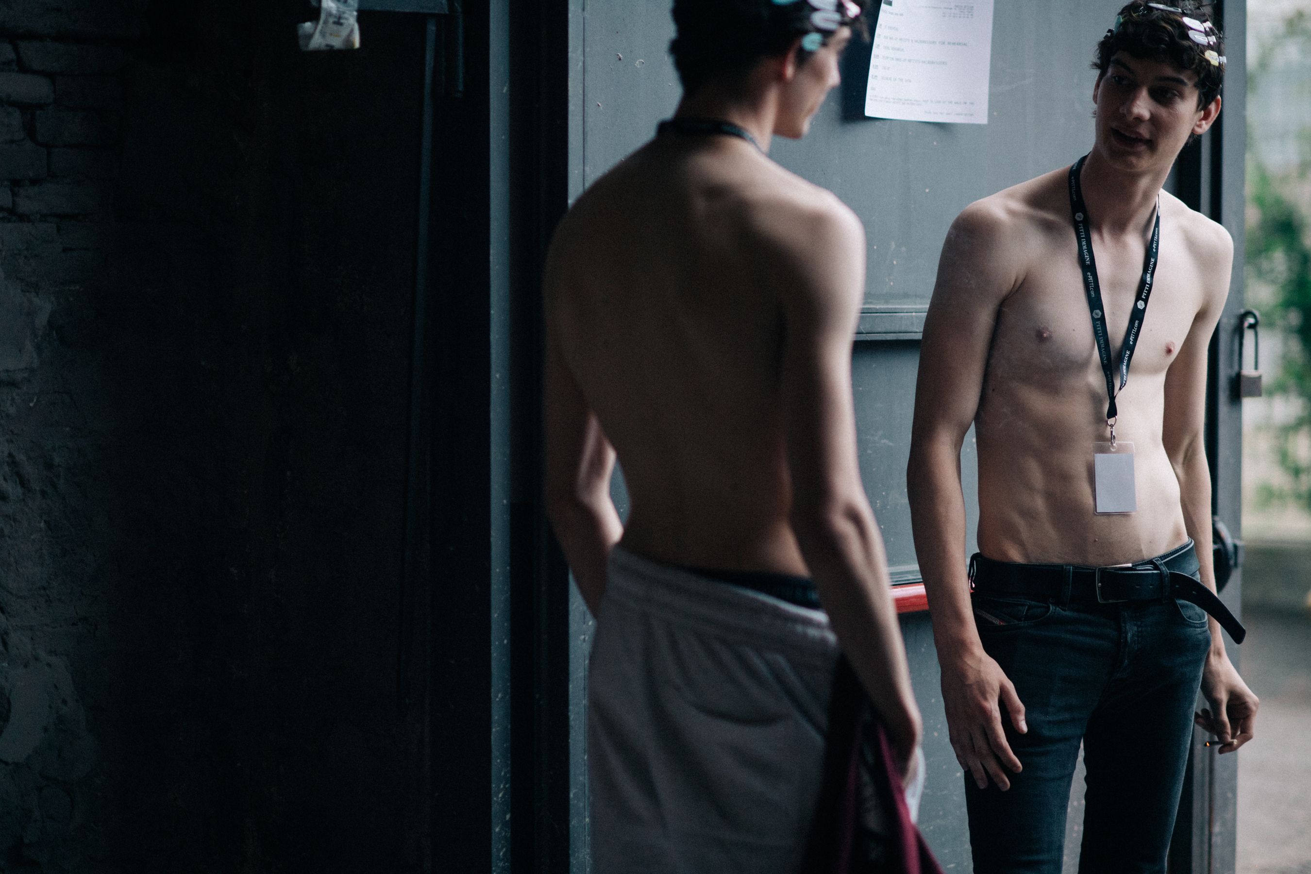 Male models getting dressed