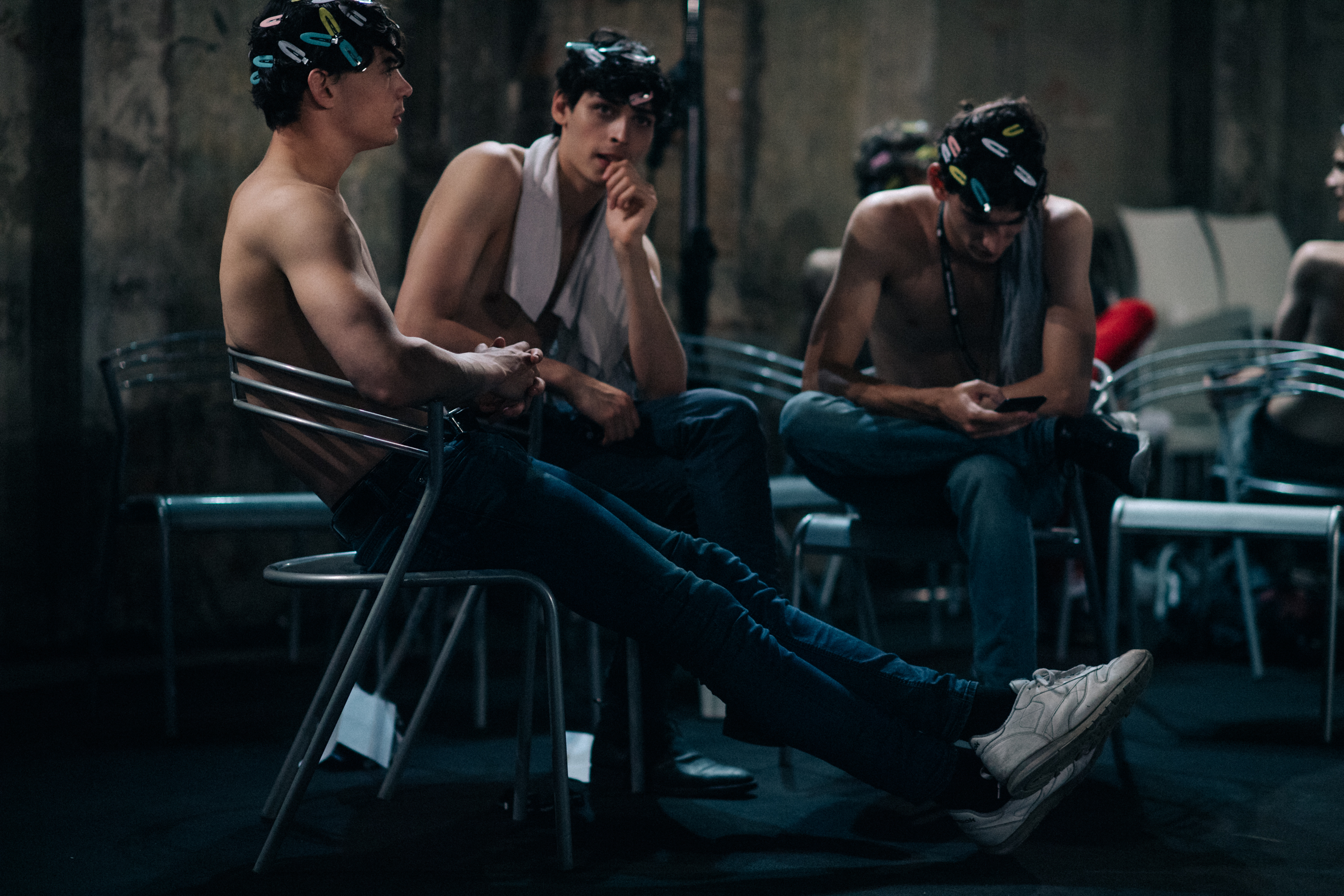 Male models hanging out together
