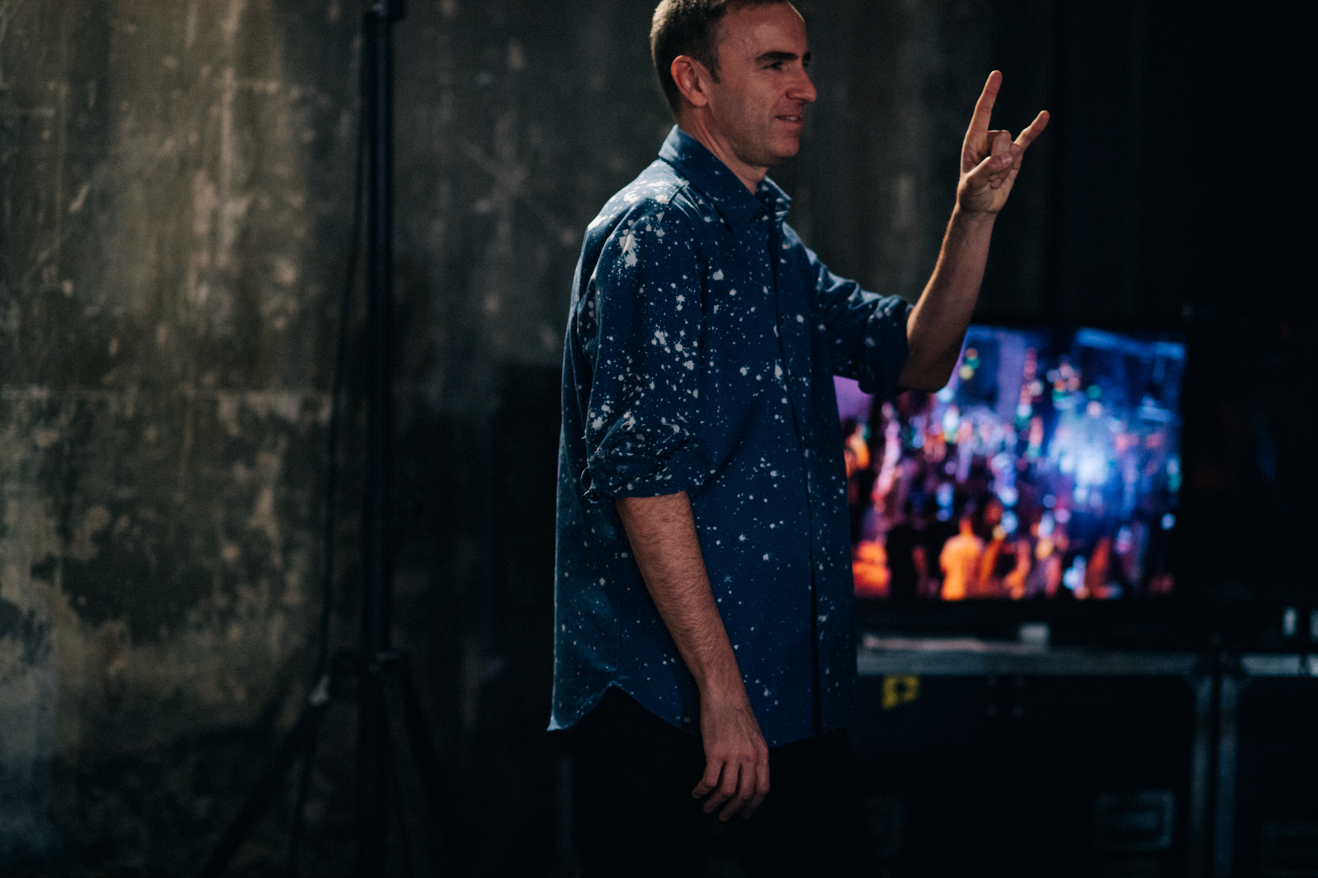 Designer Raf Simons visitting backstage