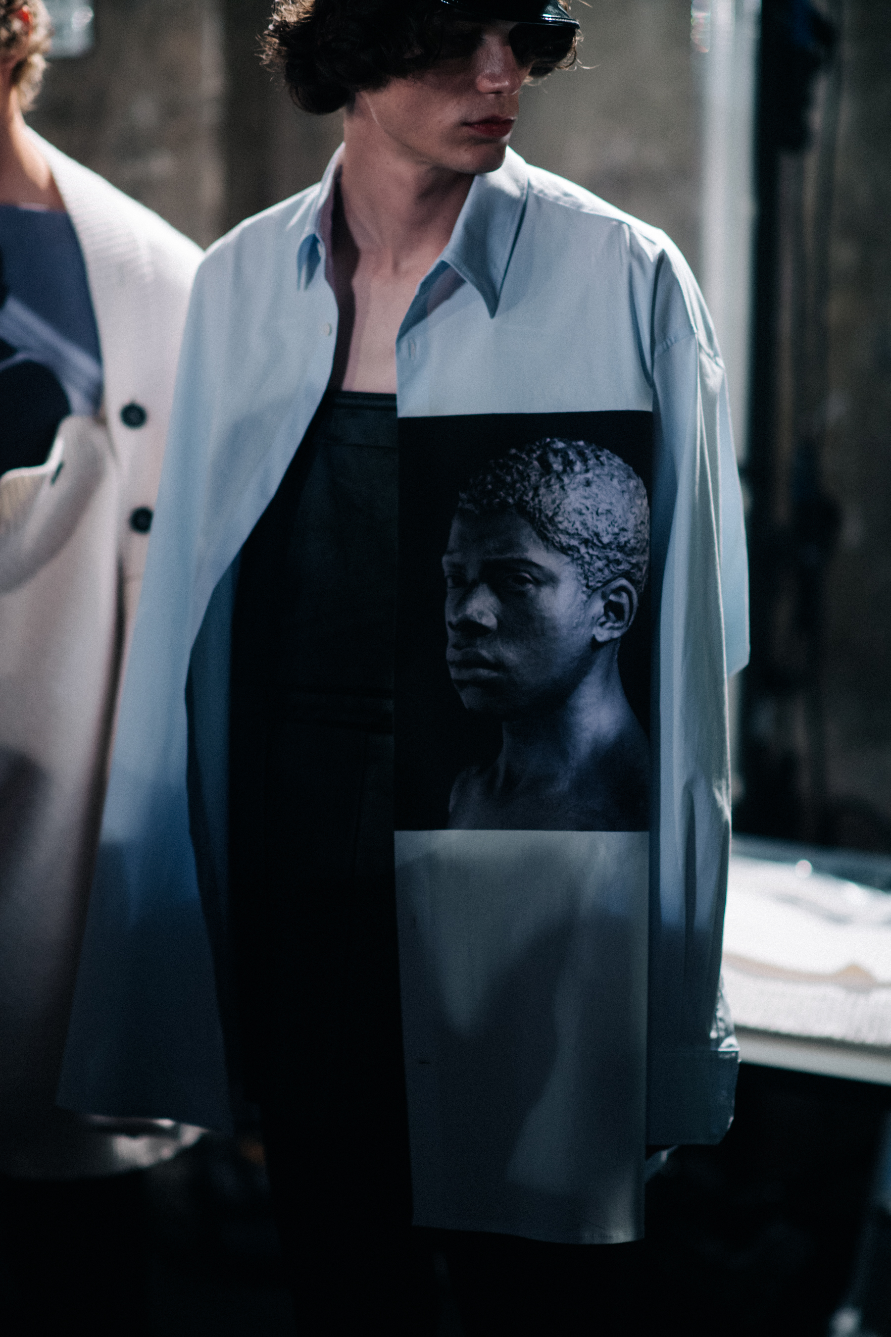 Blue shirt with a black and white photo