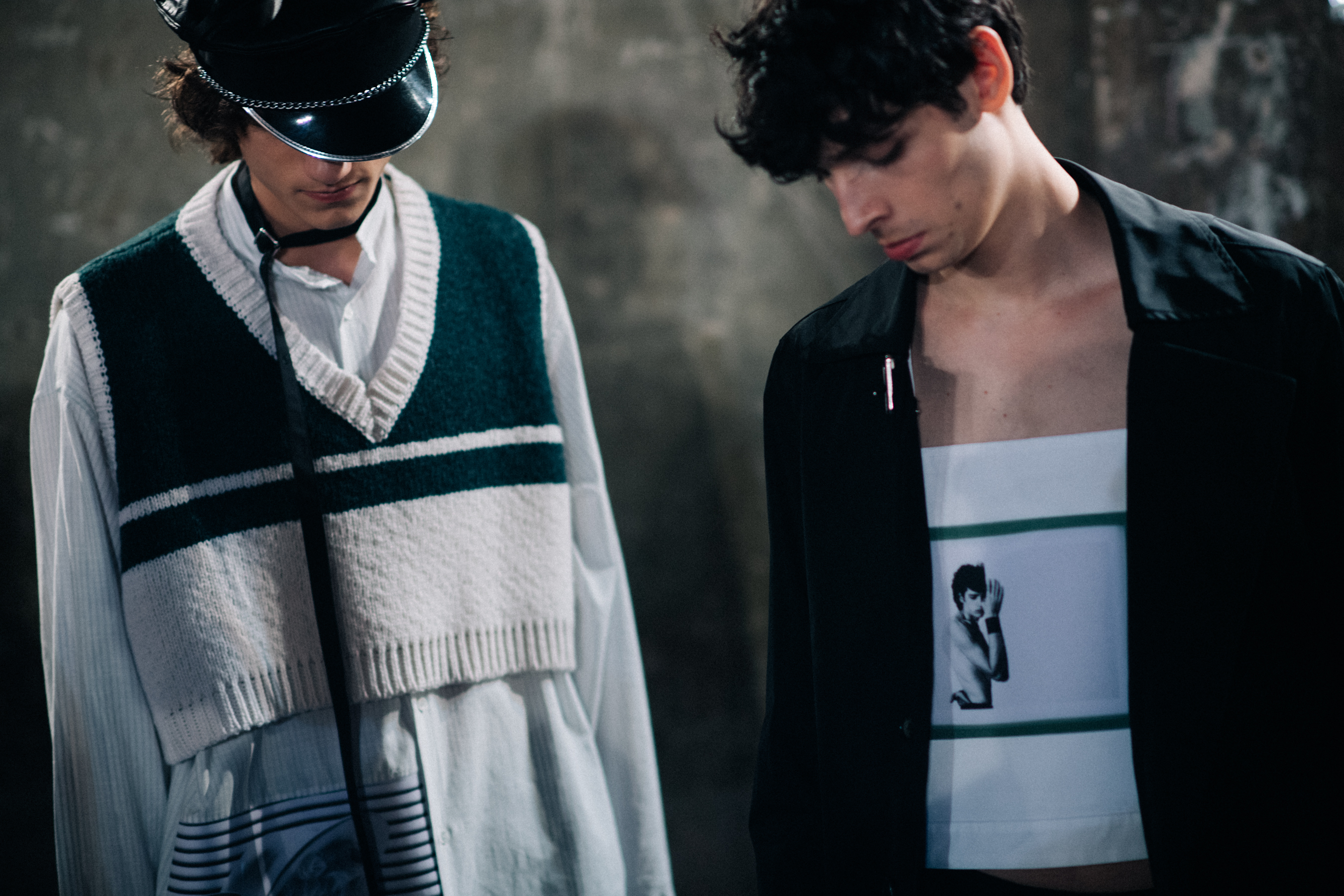 Two models posing in show pieces