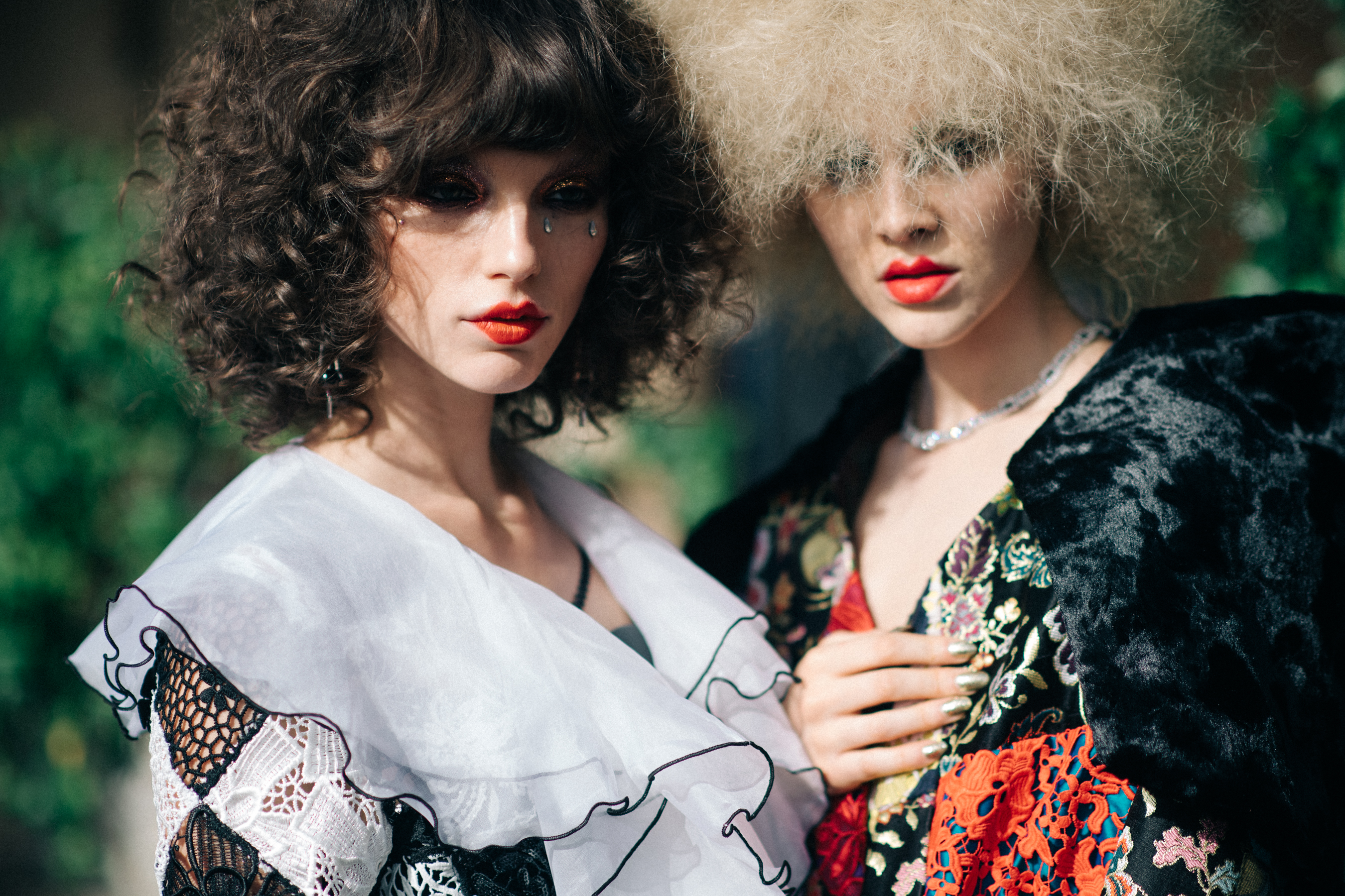 White ruffles, colourful patterns on dresses