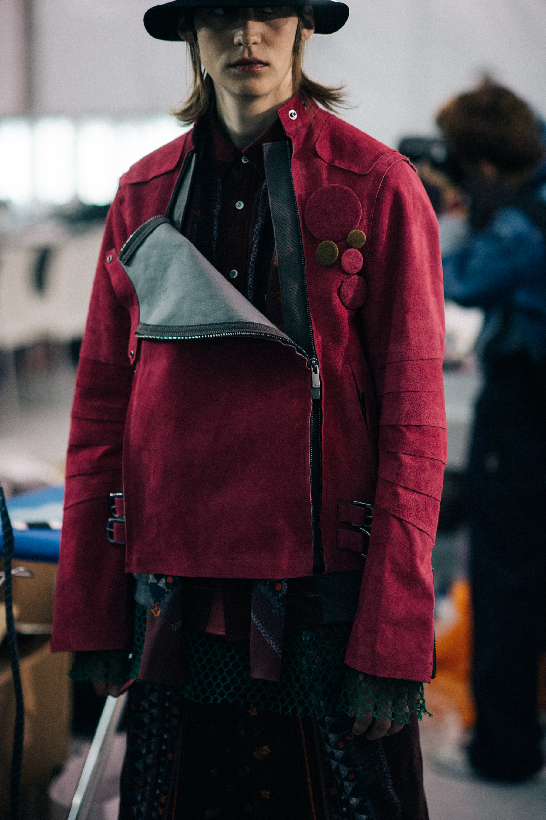Model wearing fuxia oversize jacket
