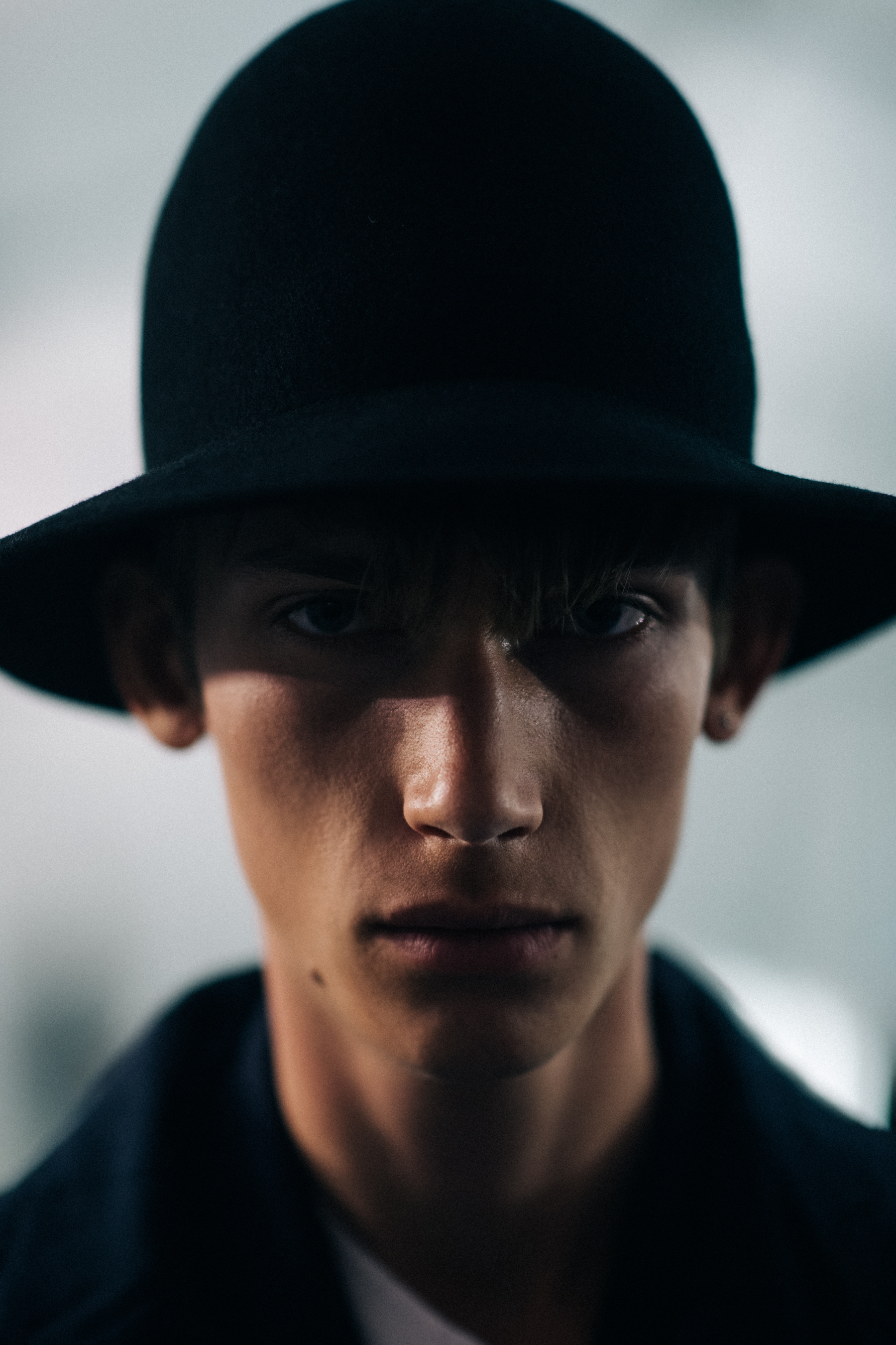 Male model wearing black hat