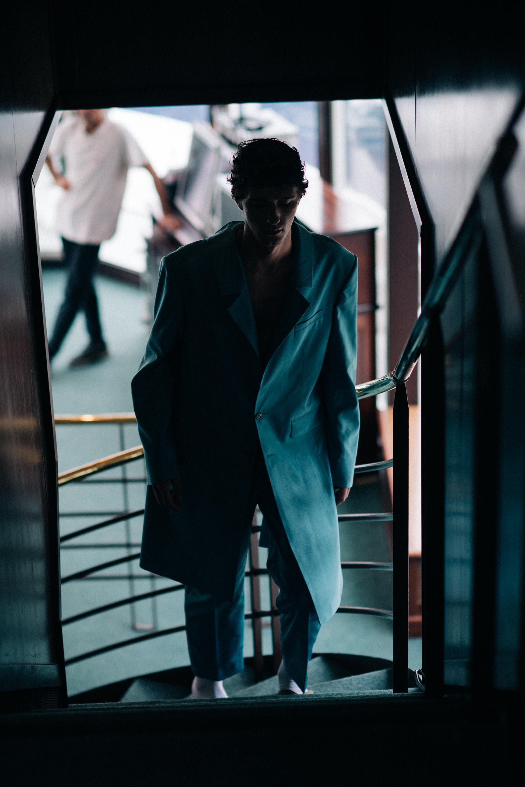 A man in a green coat