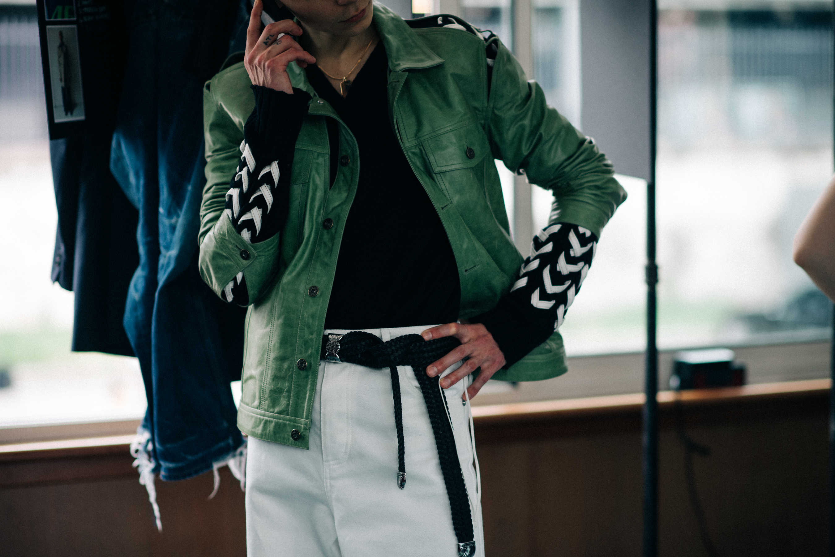 A man in a green jacket