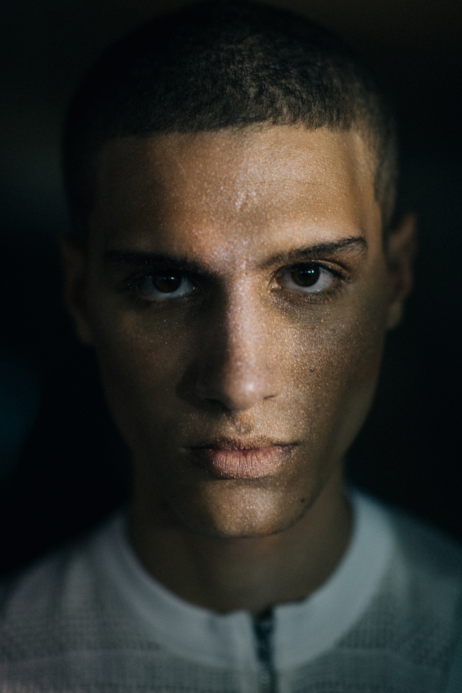 Portrait of a moel with a scar