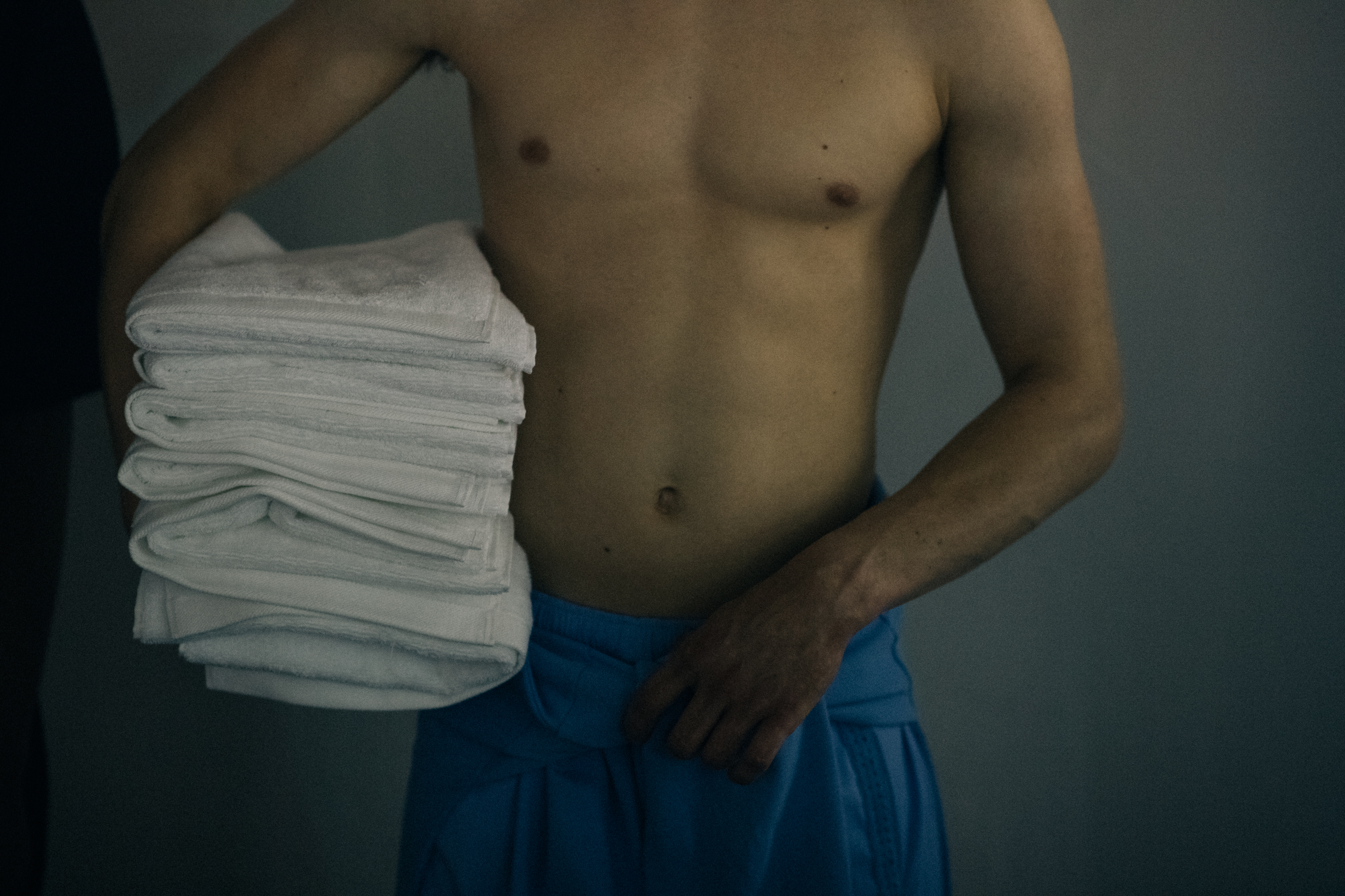 Male model in light blue trousers