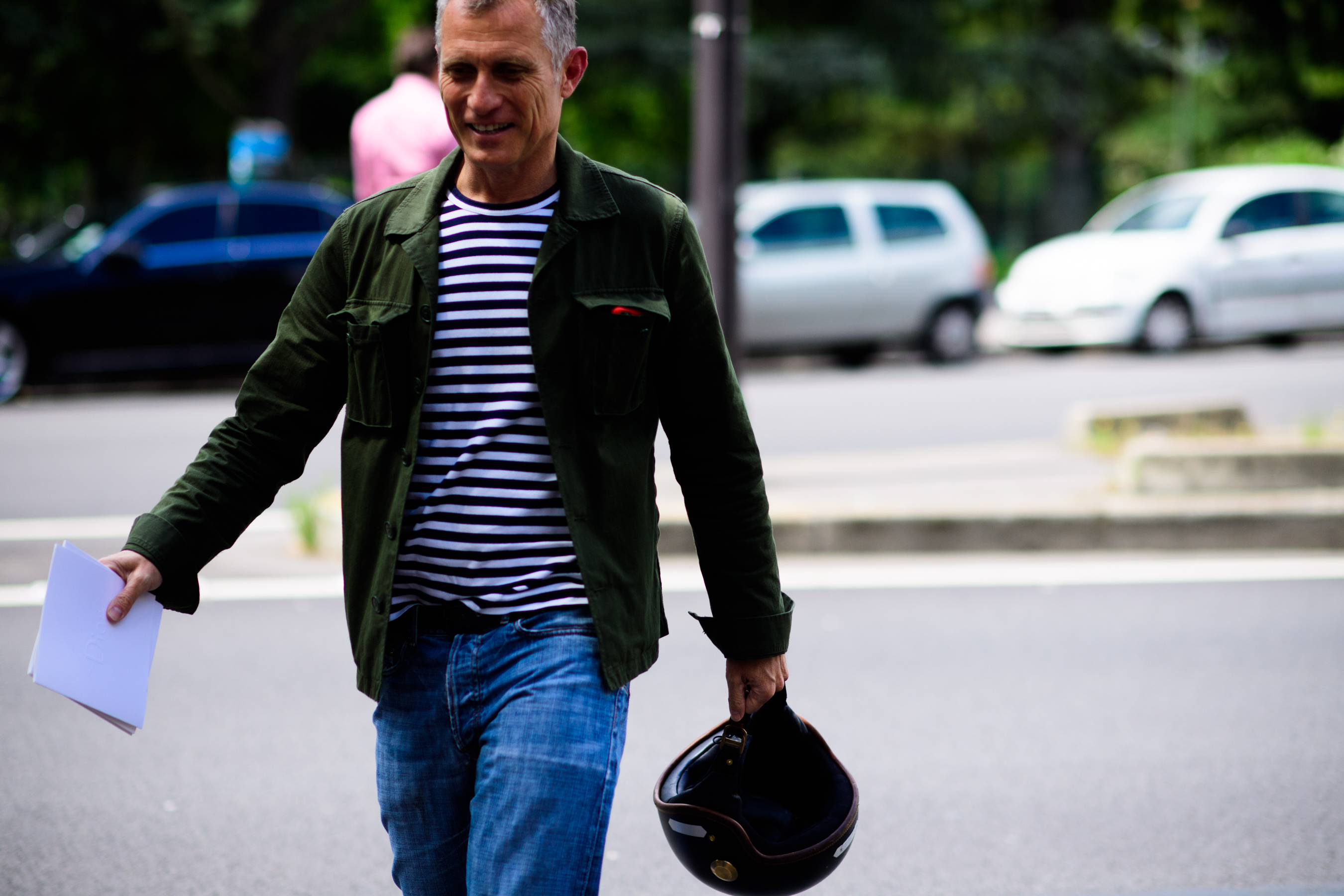 Man wearing dark green jacket
