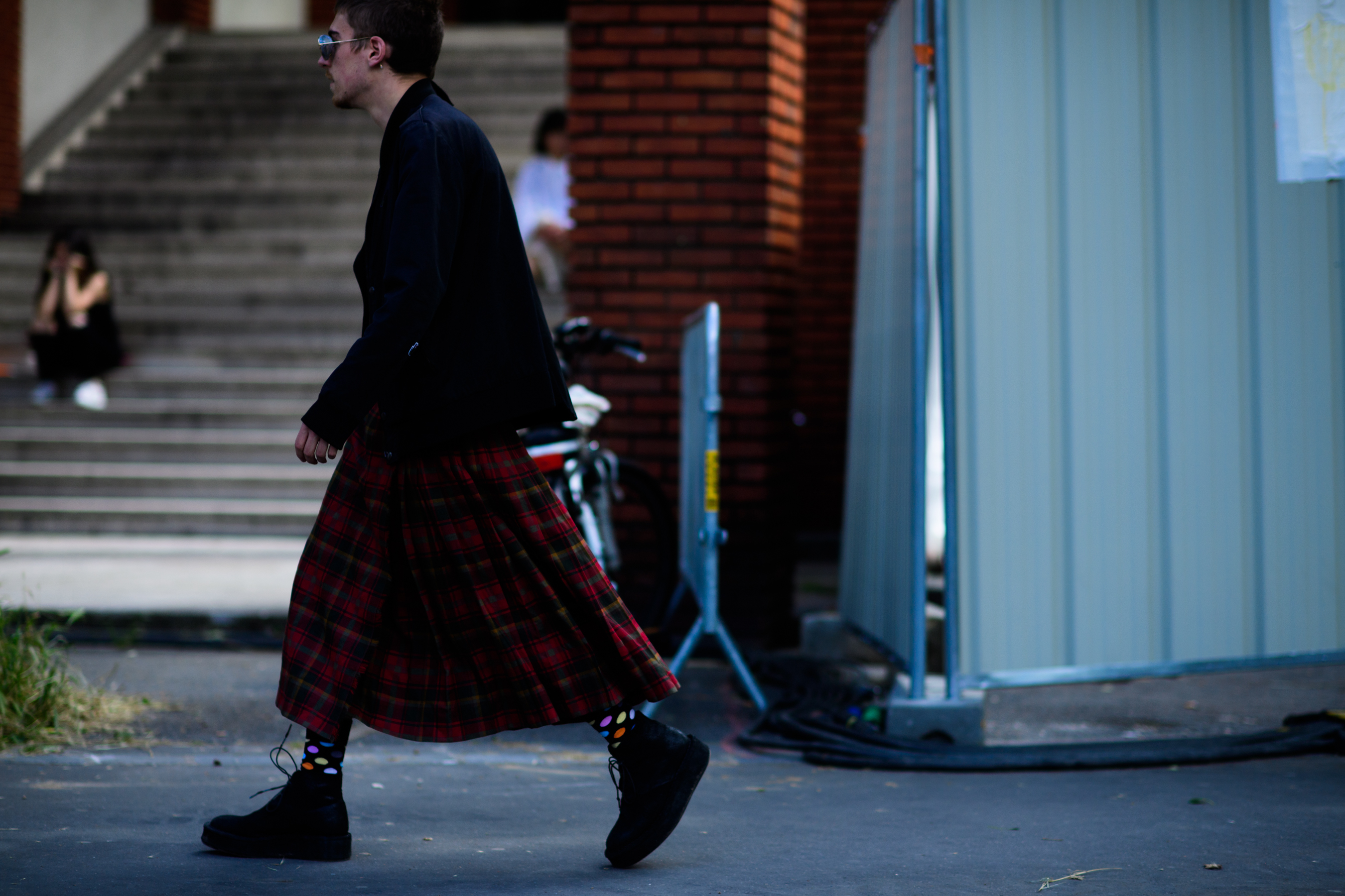Man in red checkered skirt