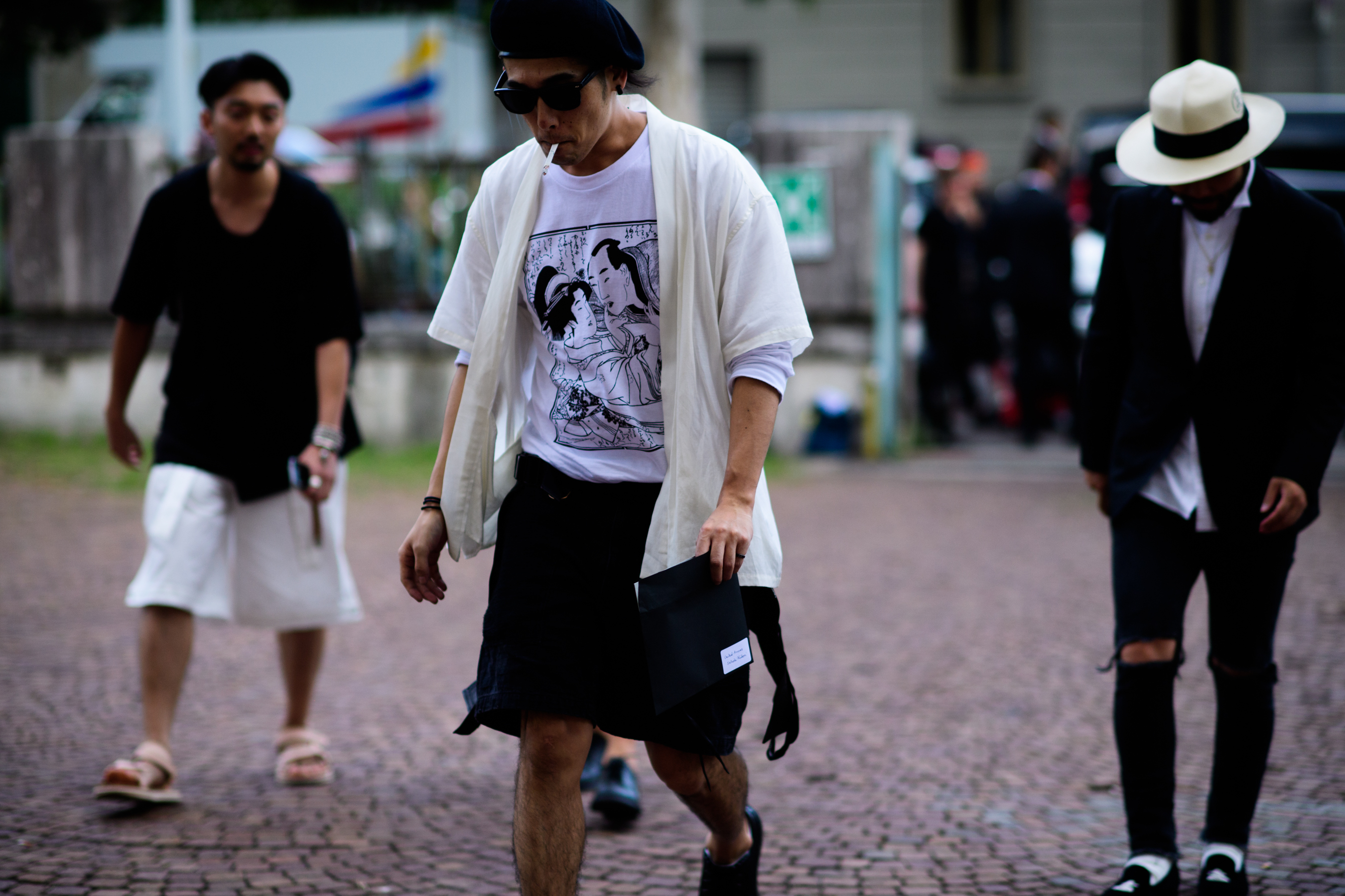 A man in a white printed T-Shirt
