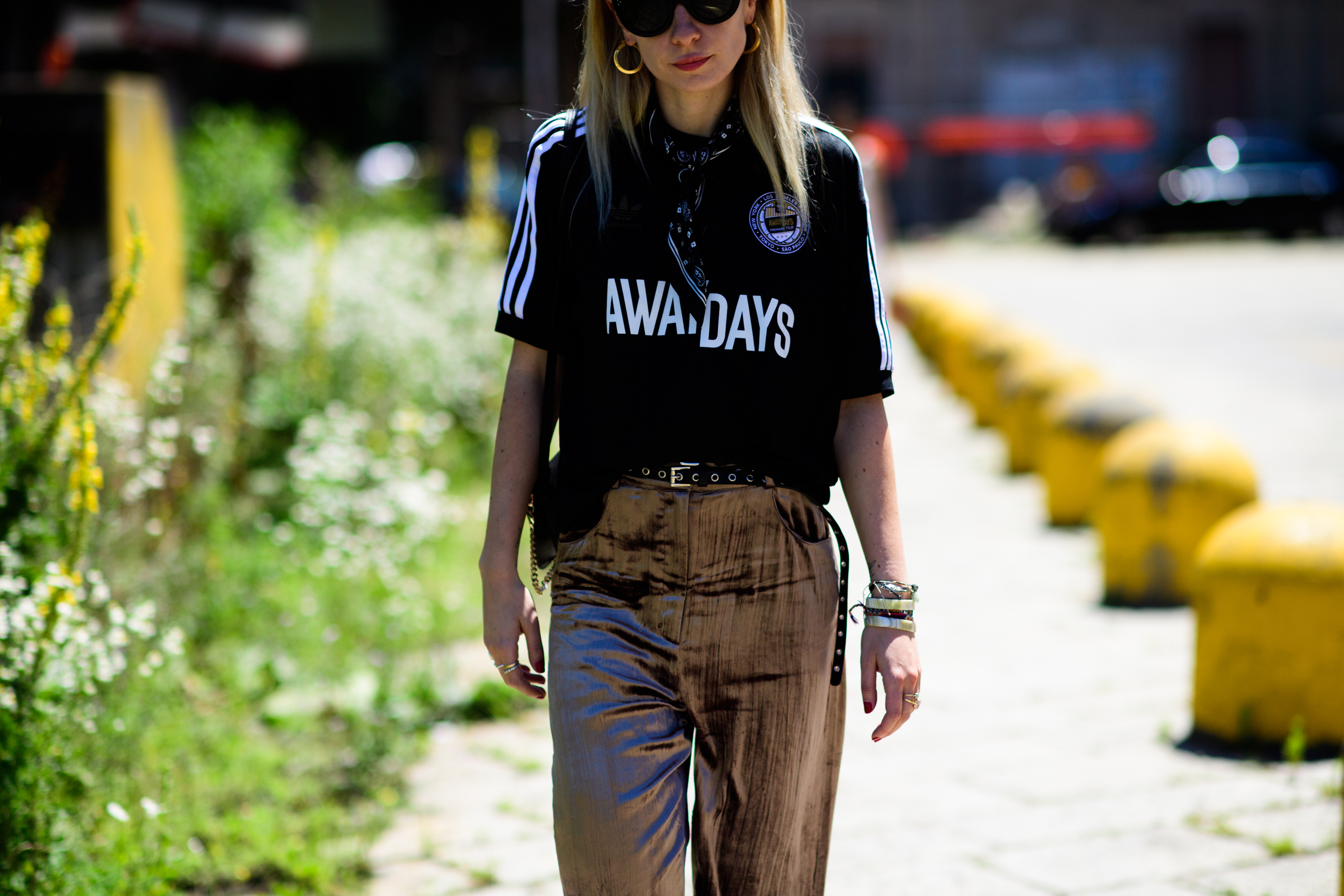 A woman in metalic trousers