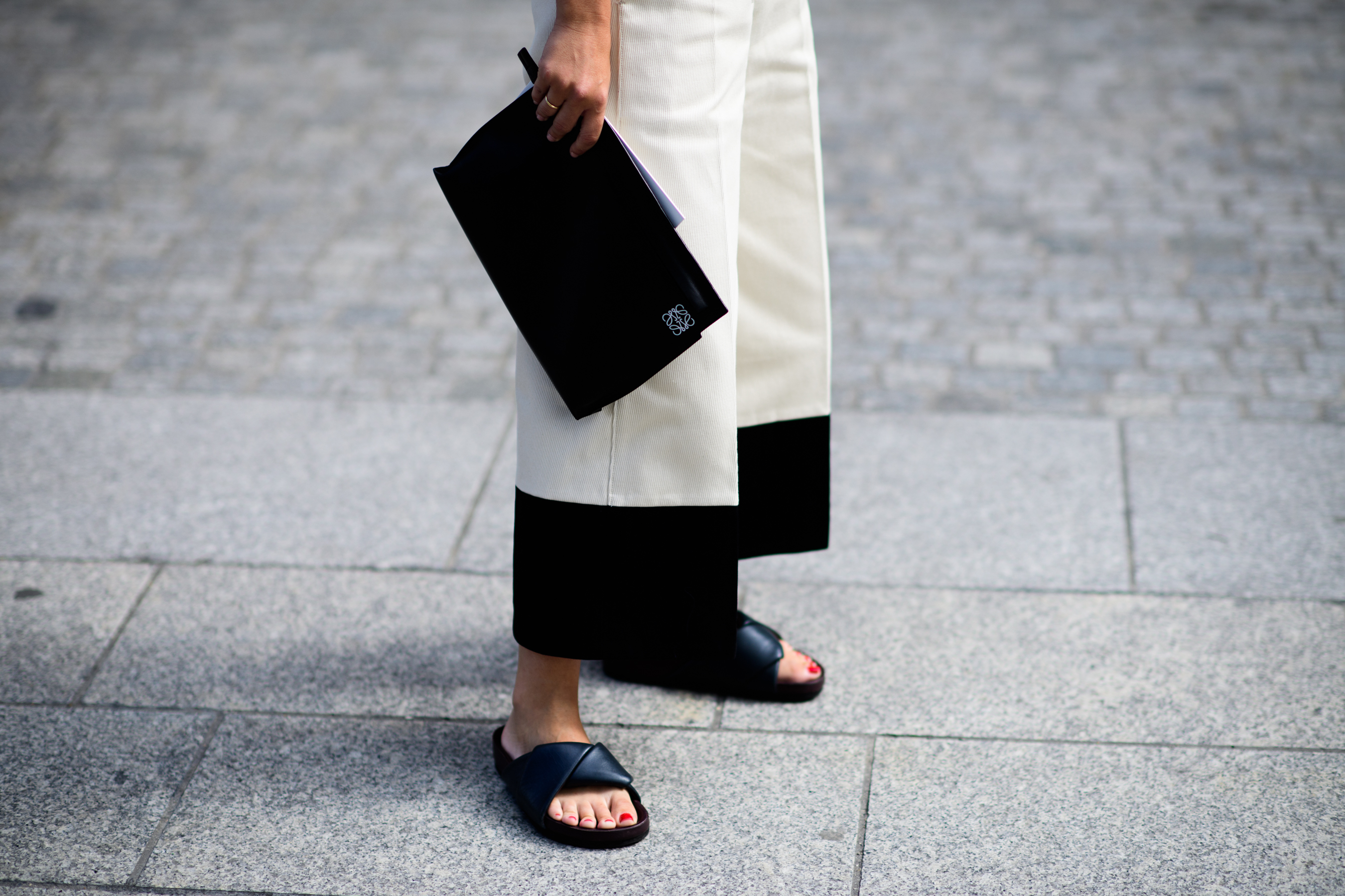 Beige trousers with black details