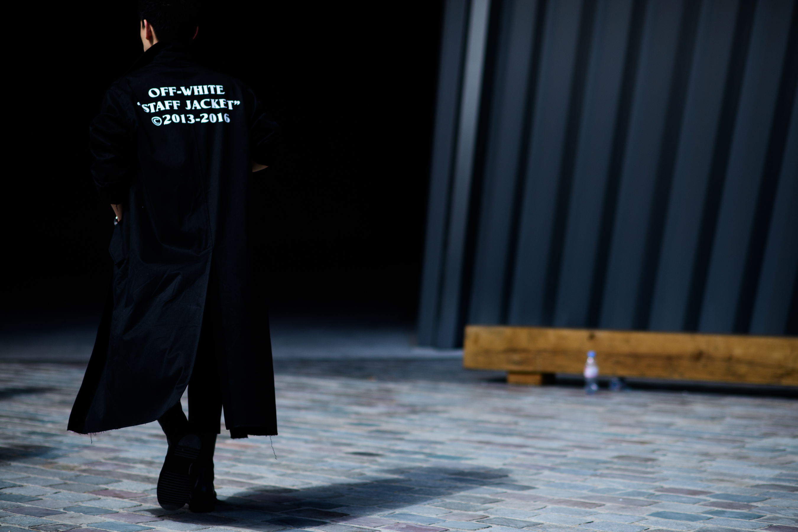 White sign on black coat