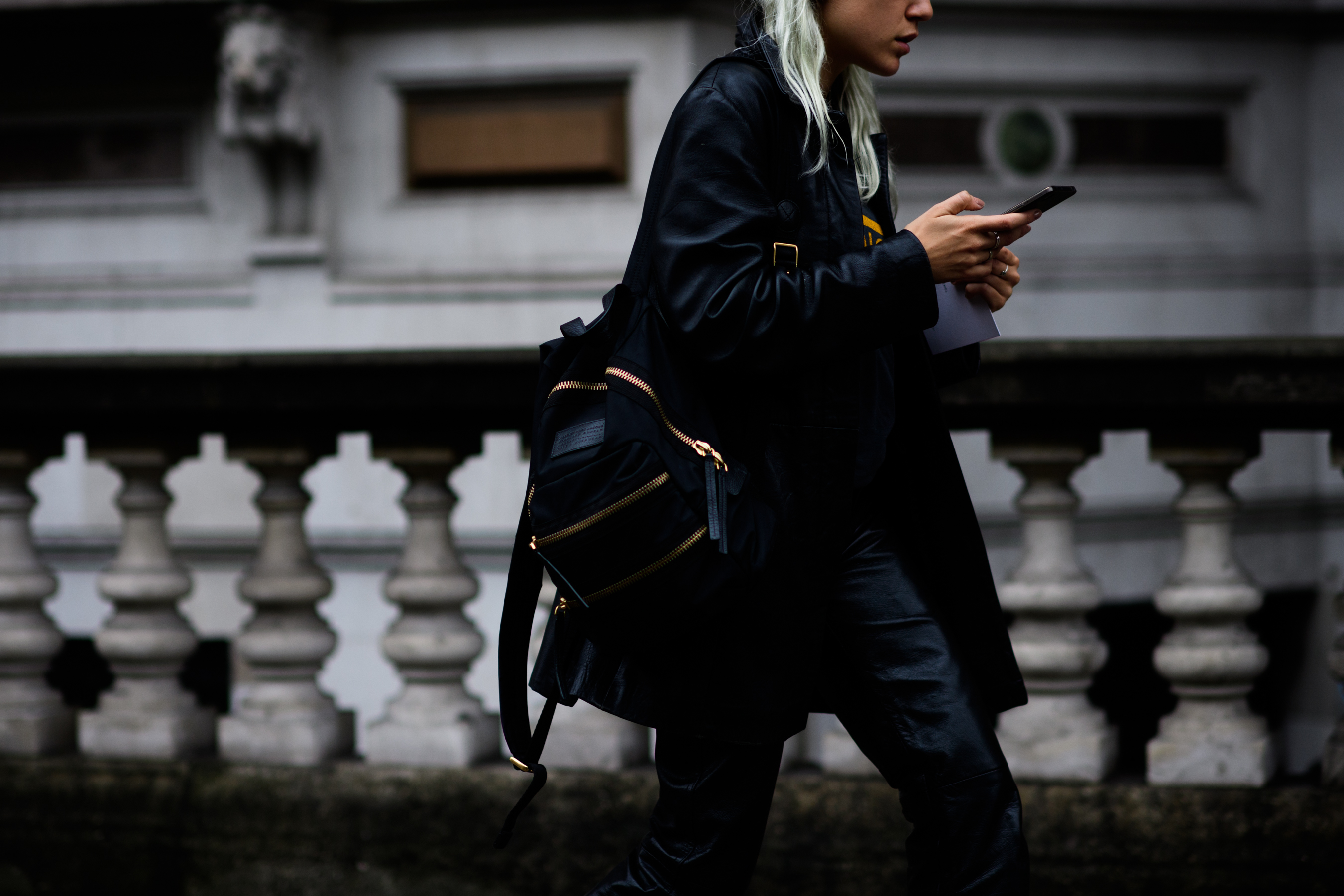 A model in an all black outfit