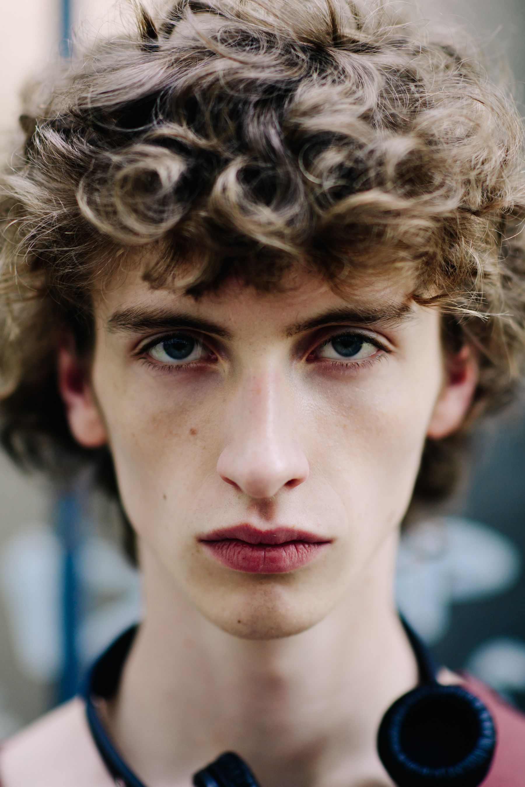 Portrait of a curly-haired man