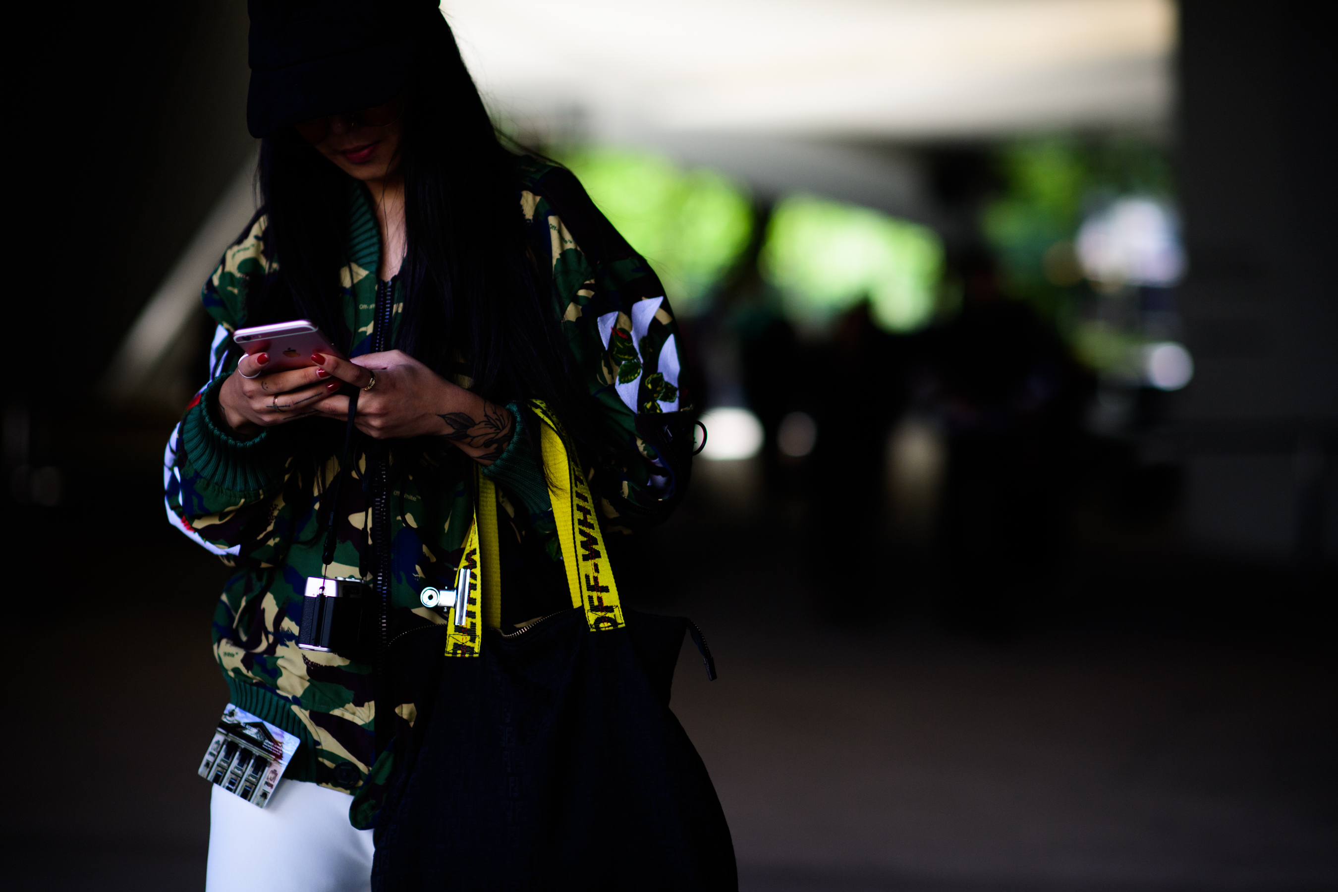 Woman wearing colourful printed blouse
