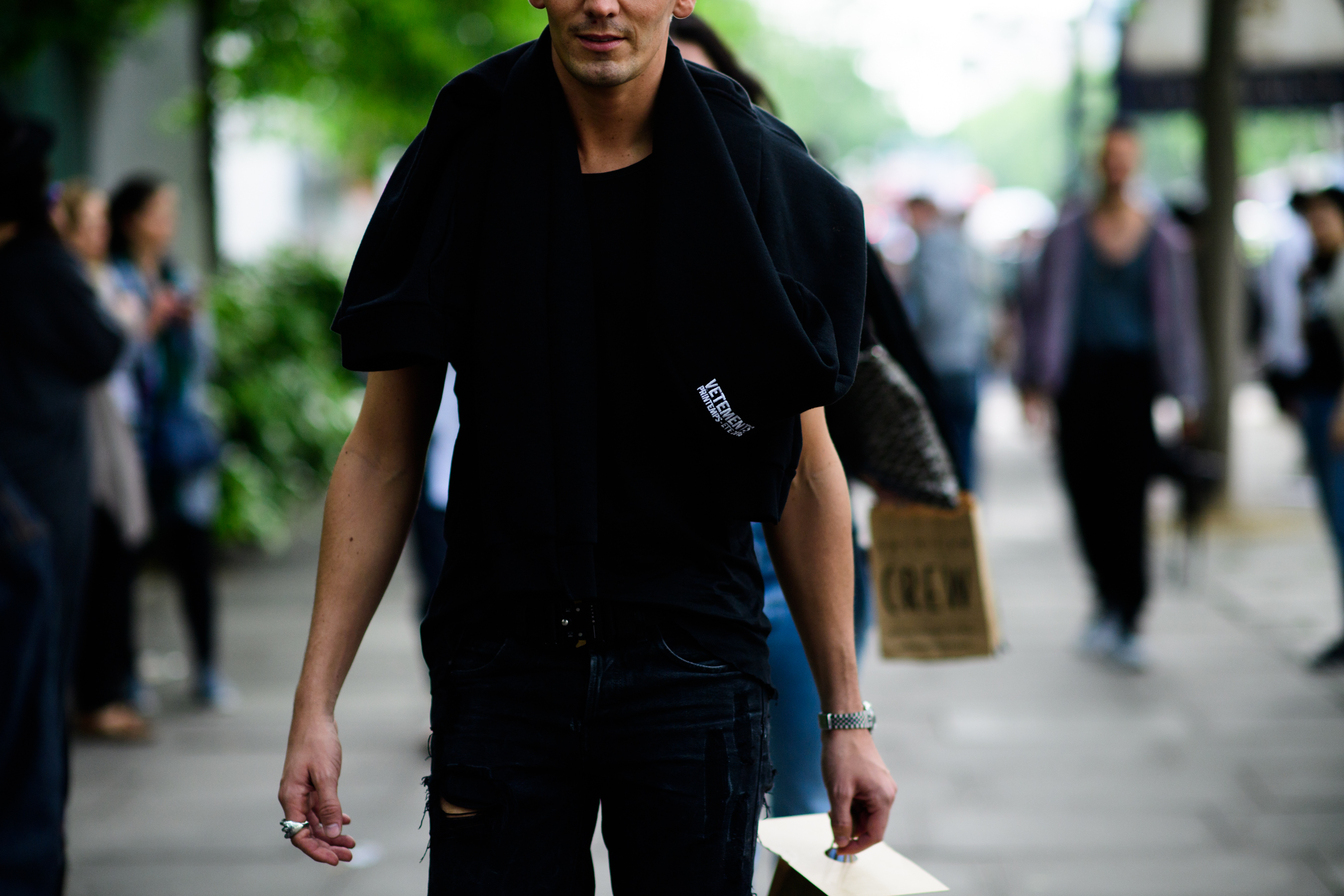 A man wearing a black sweatshirt