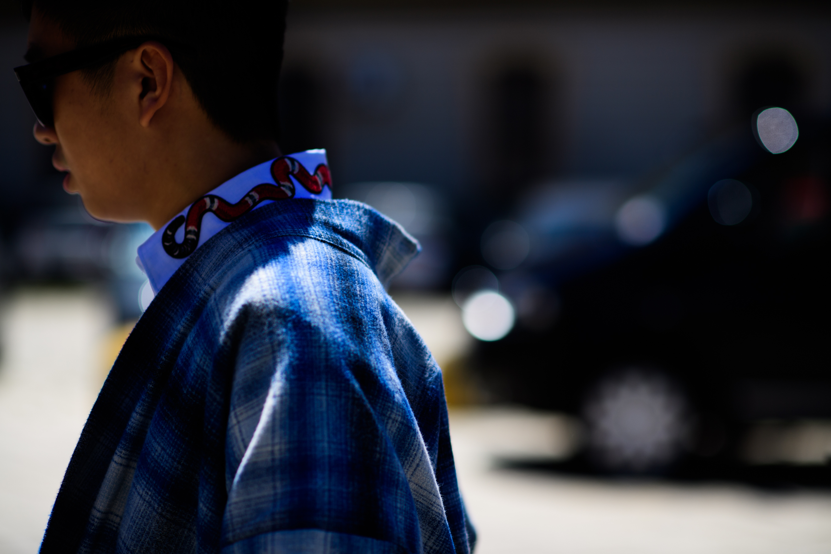 A main a blue checkered jacket