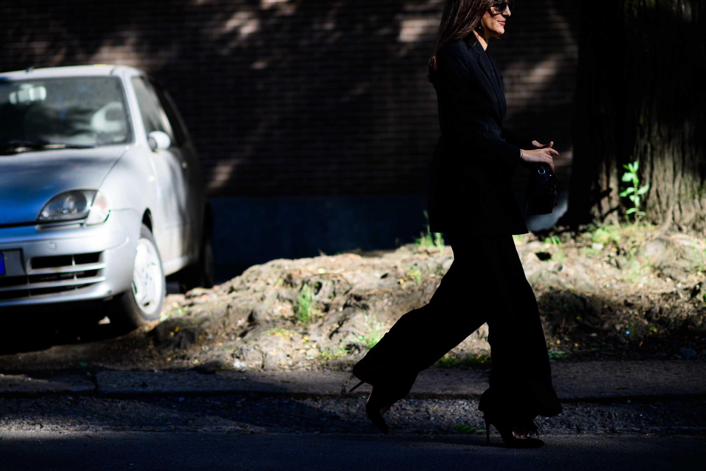 A woman in a black suit