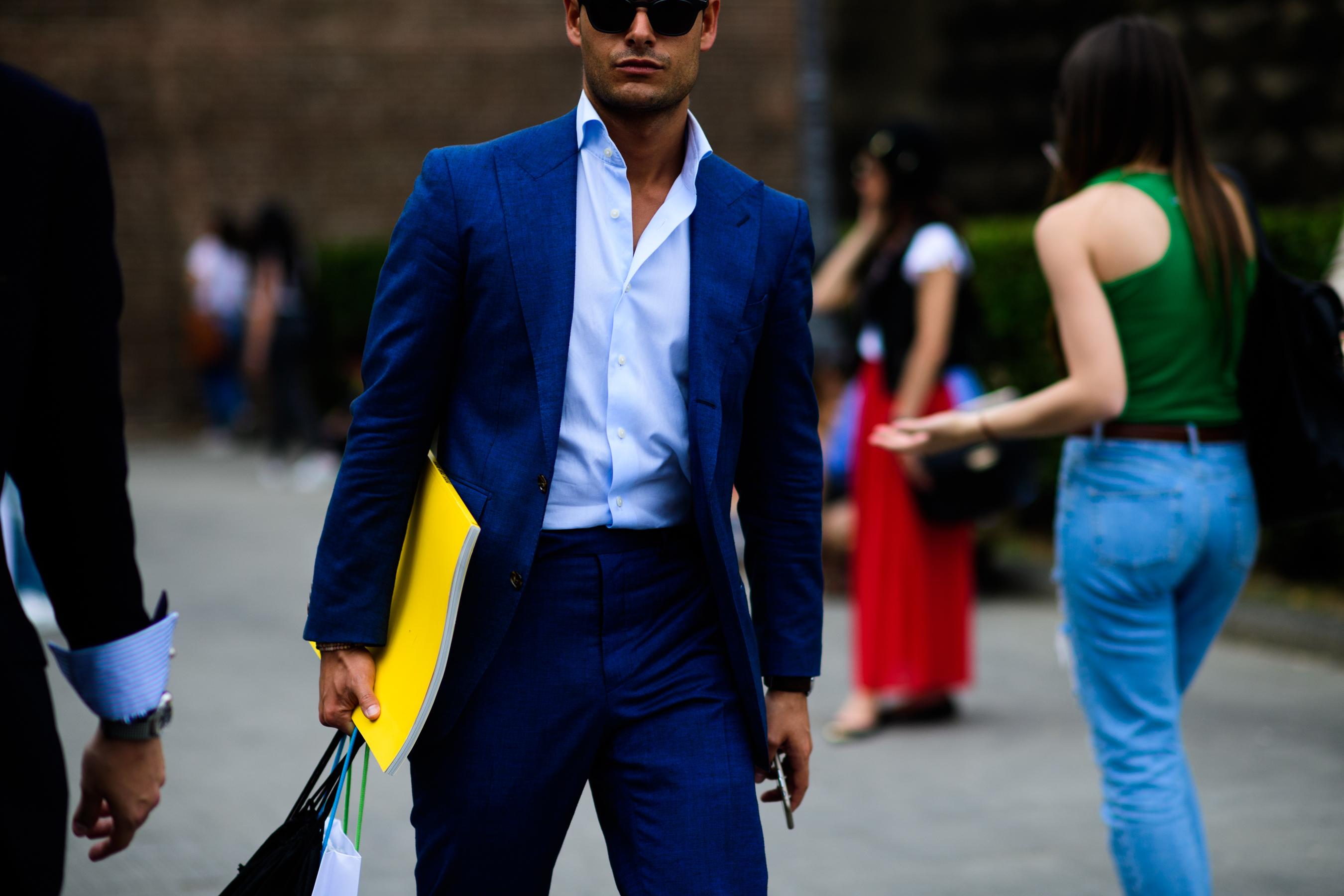 A man wearing a blue suit