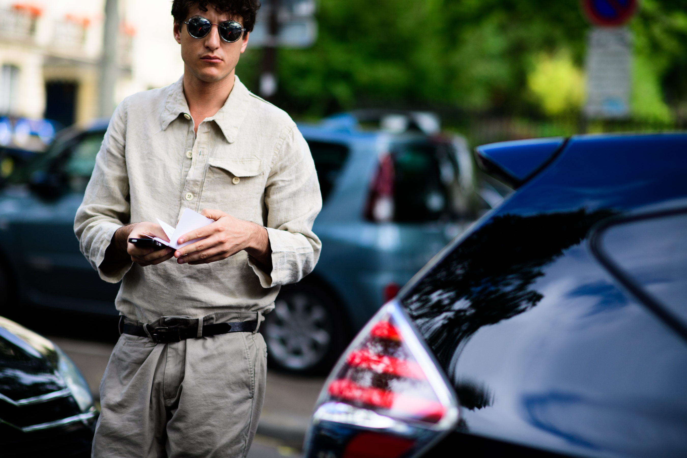 Beige shirt and grey trousers