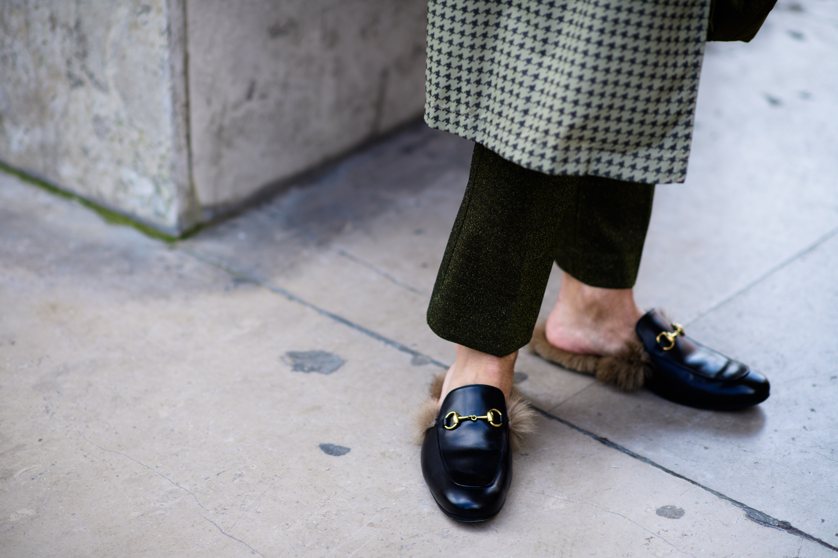 Checkered coat worn with trousers