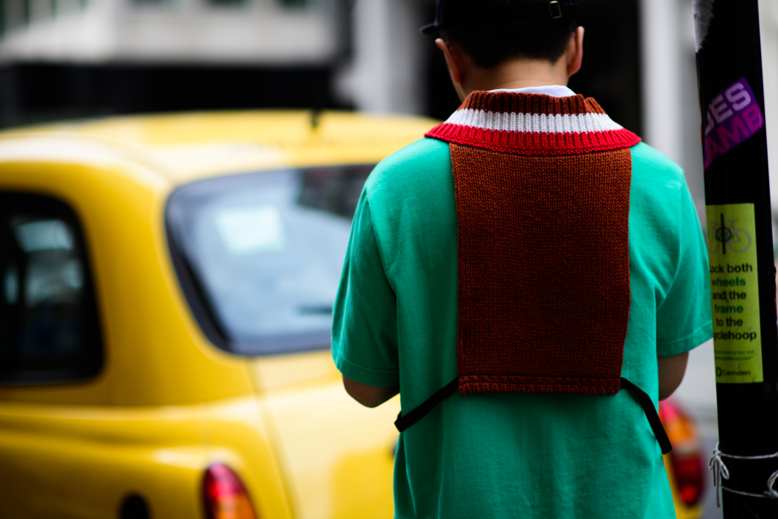 Green sweater with red details