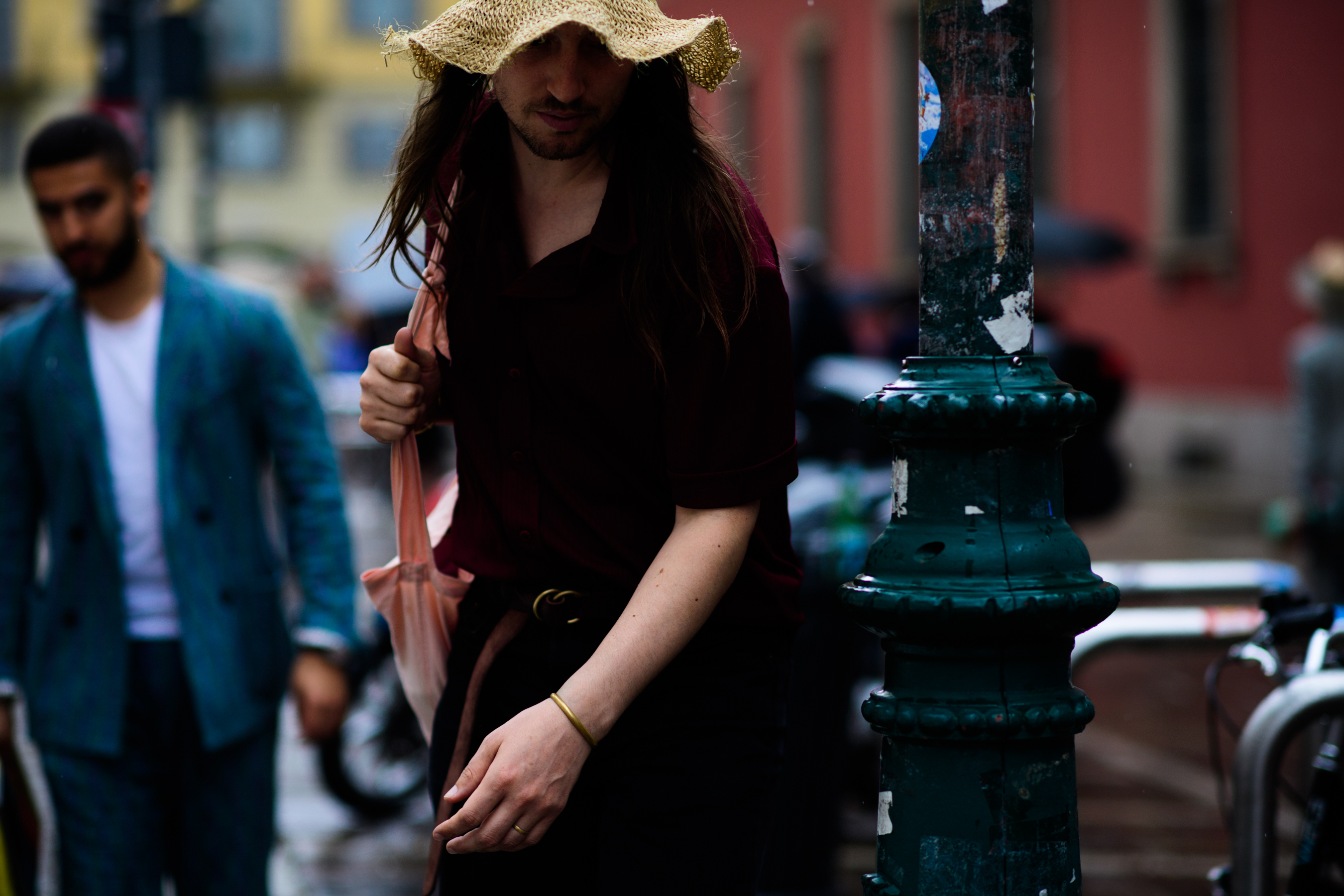 A man wearing a yellow hat