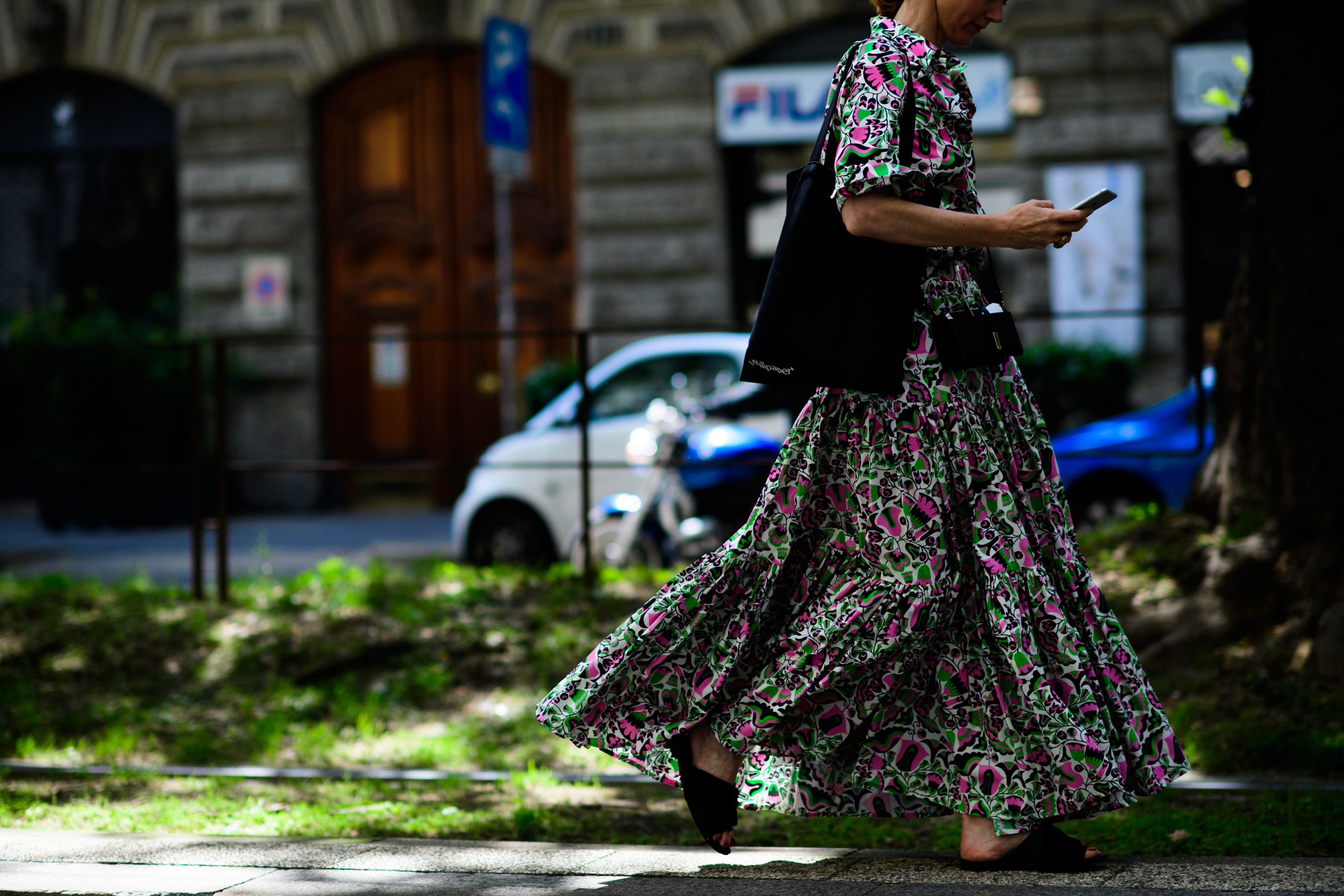A woman in a printed maxi dress
