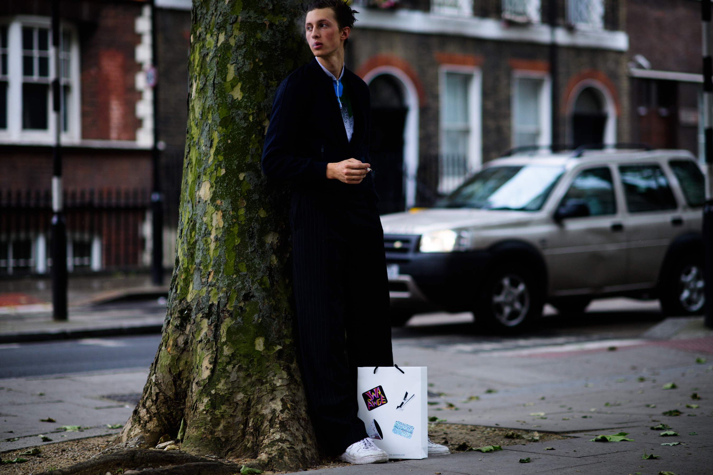 A man in a dark blue coat
