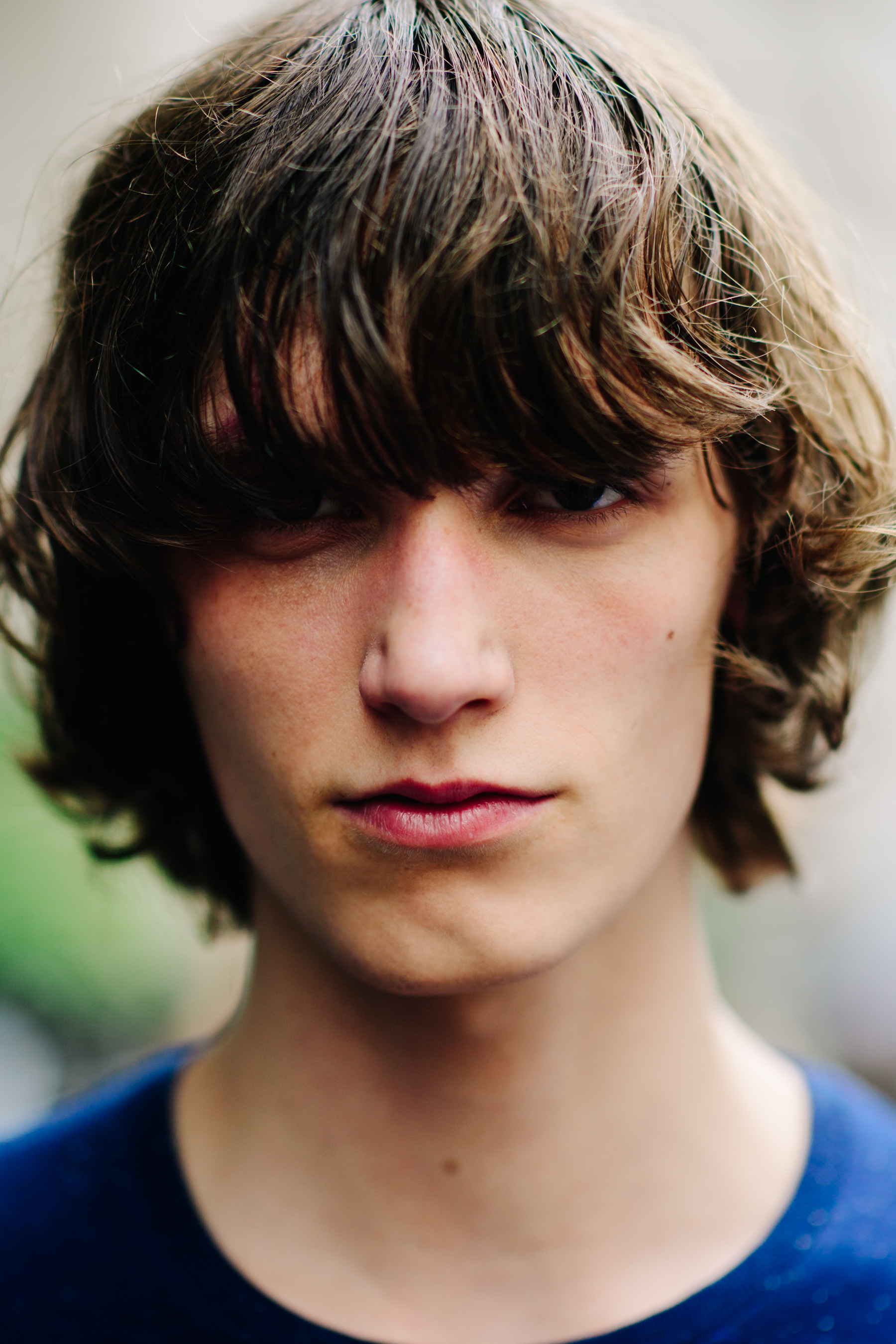 Male model posing between shows