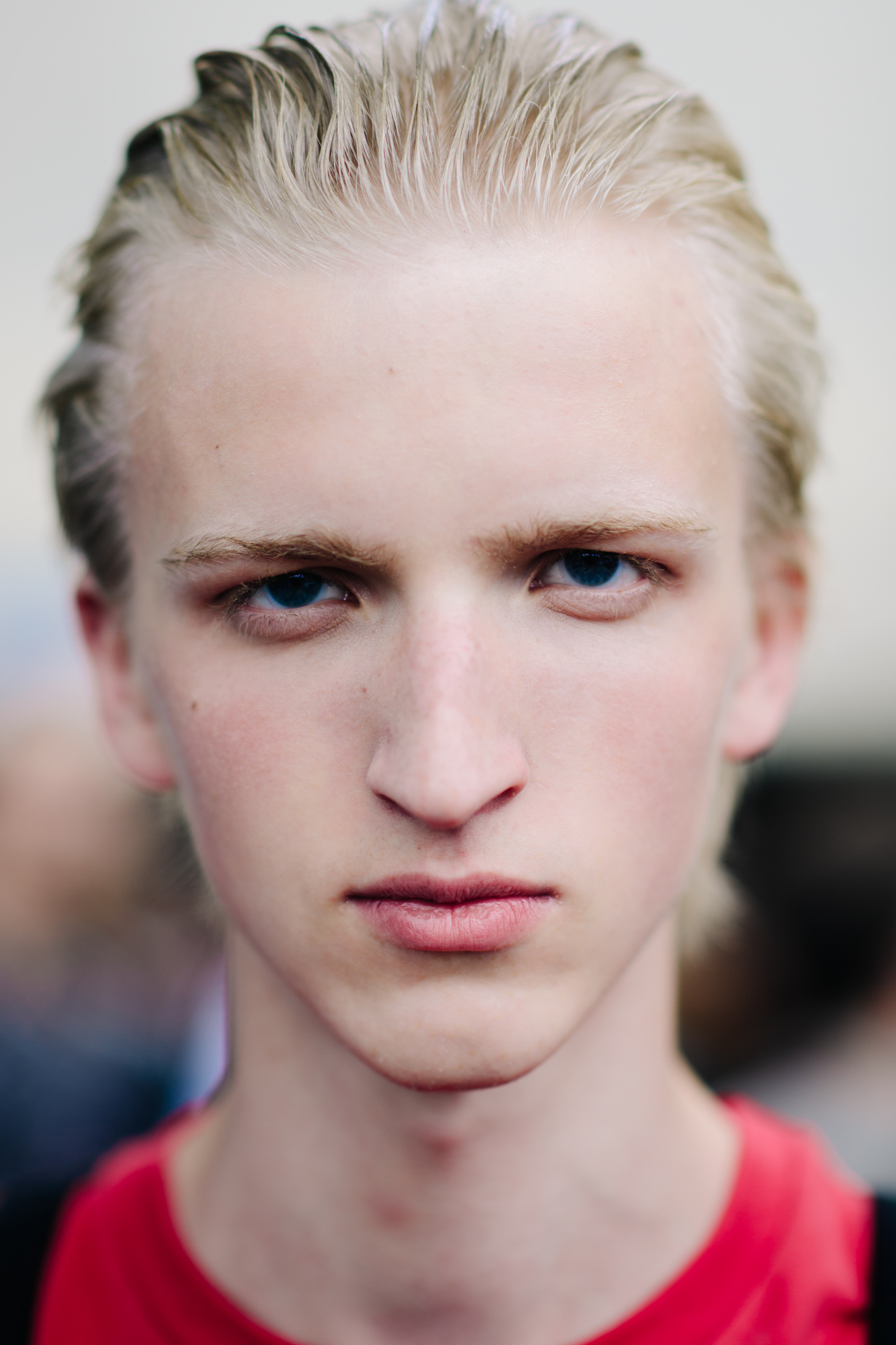 Blond blue-eyed male model portrait