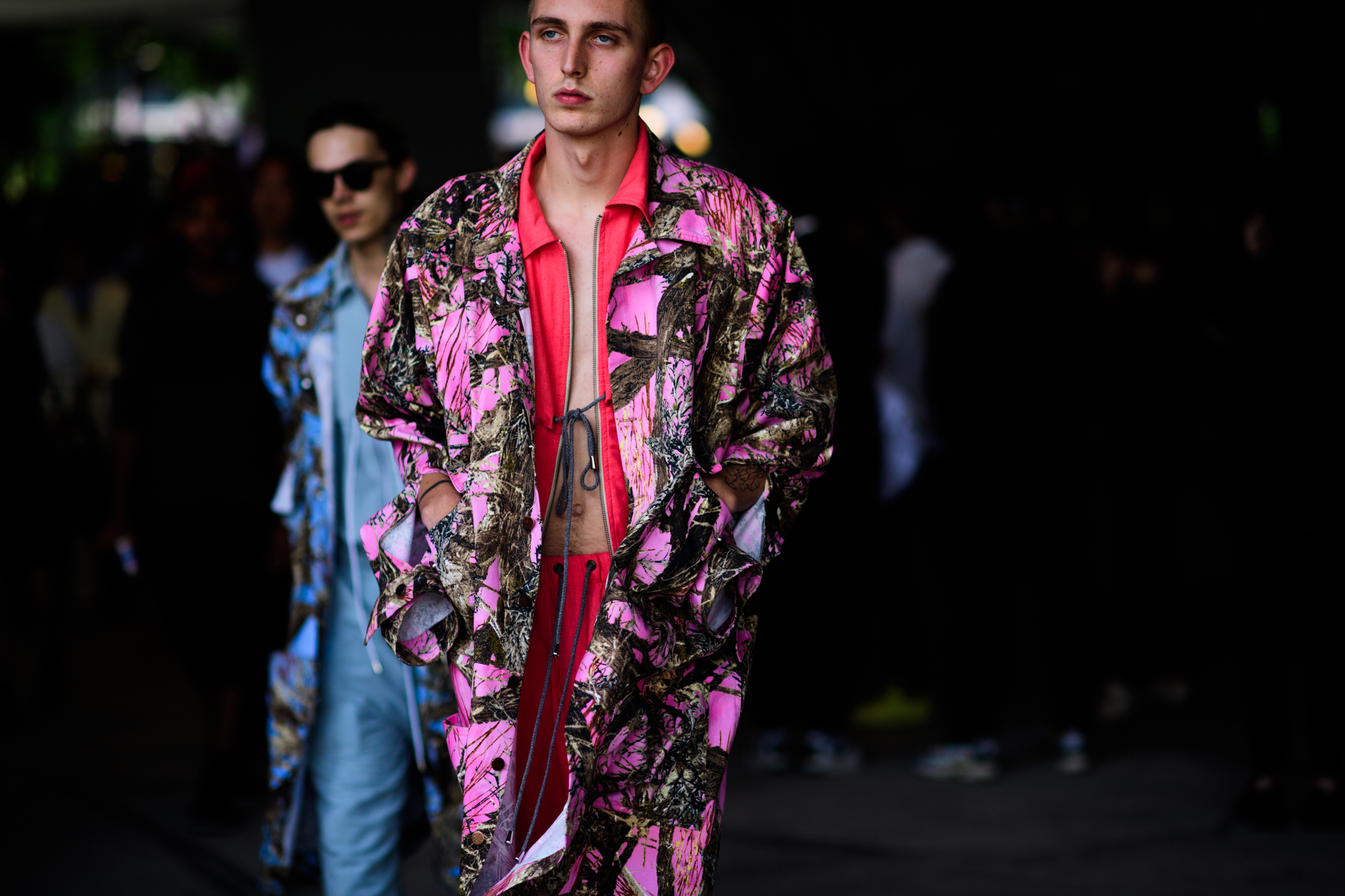 Coral suit and purple coat