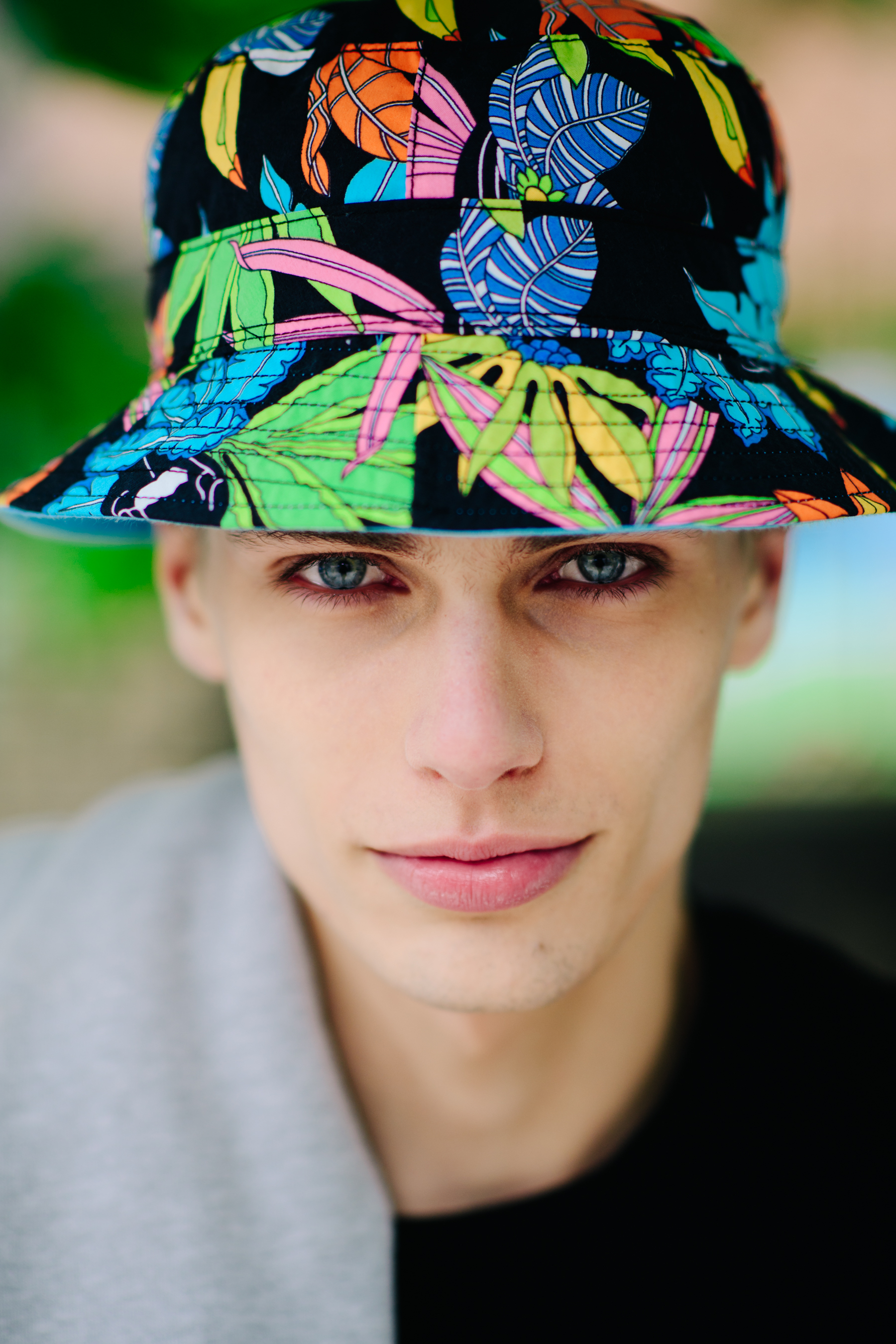Portrait of a model in a bright hat