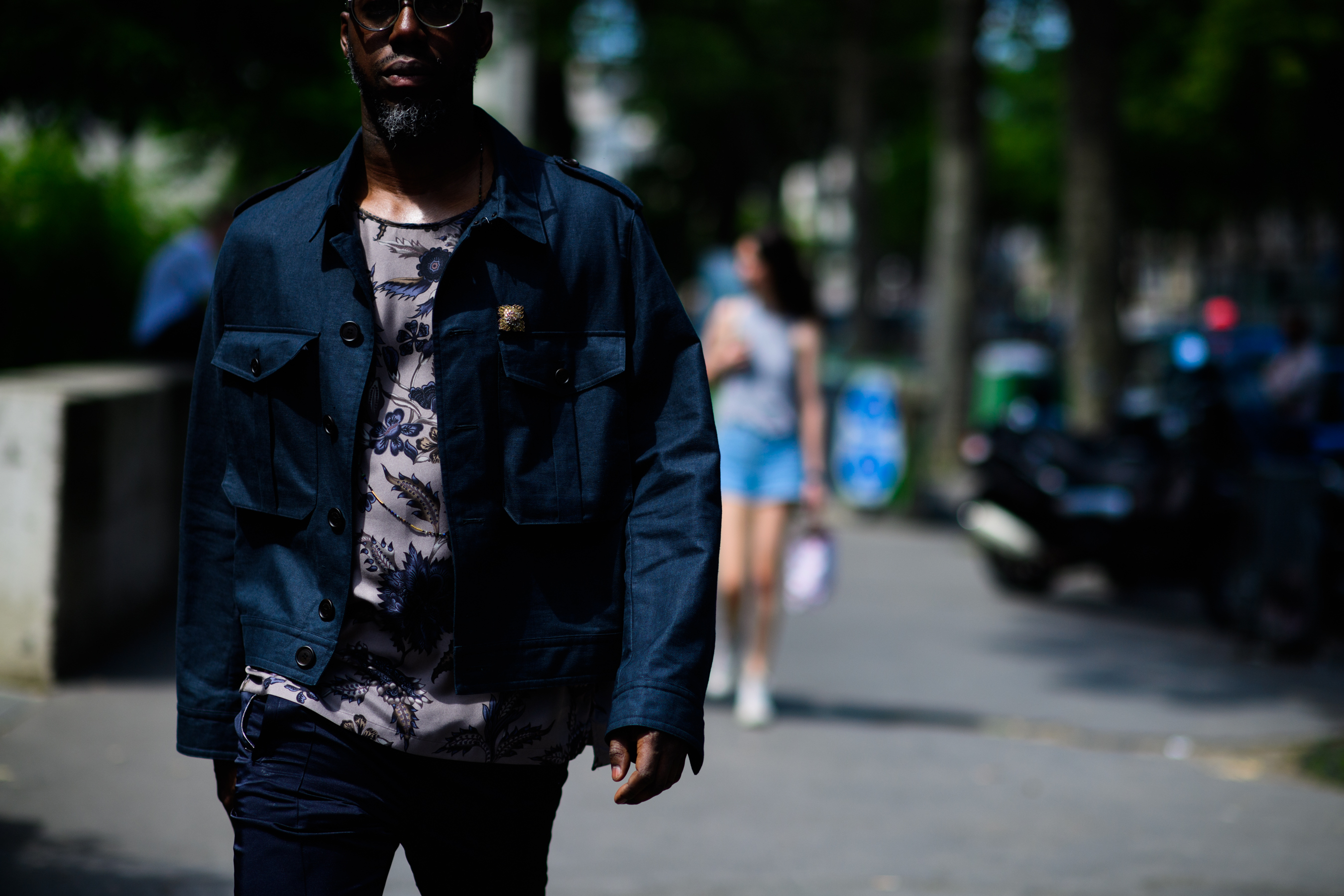 A man in a dark blue jacket