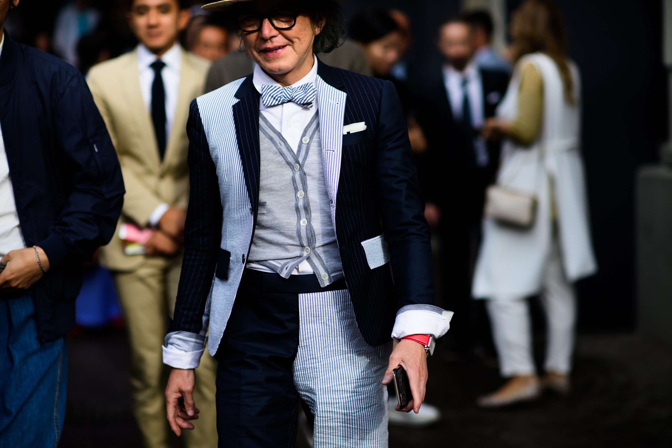 A man in a suit and a bowtie