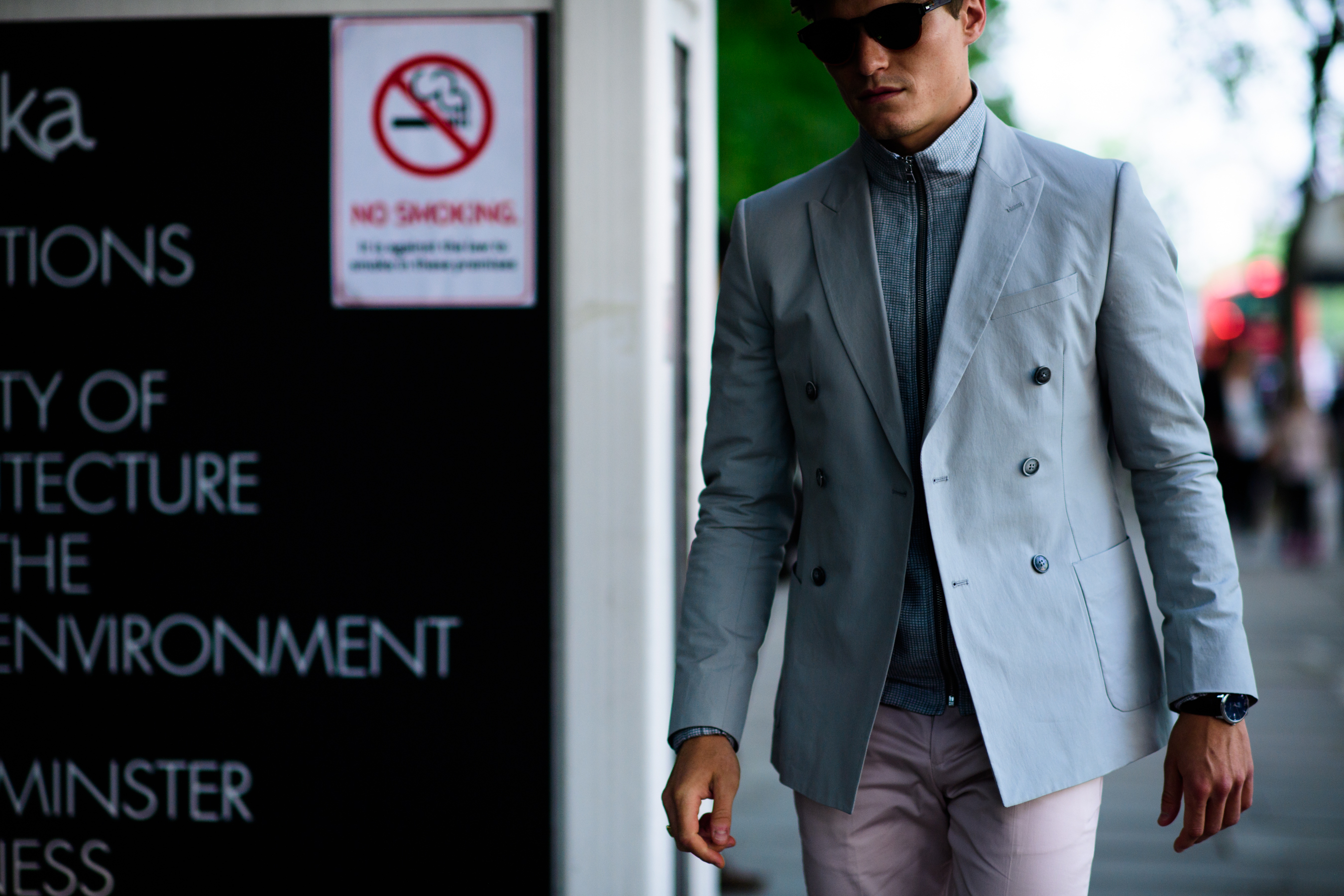 A man wearing a light blue jacket