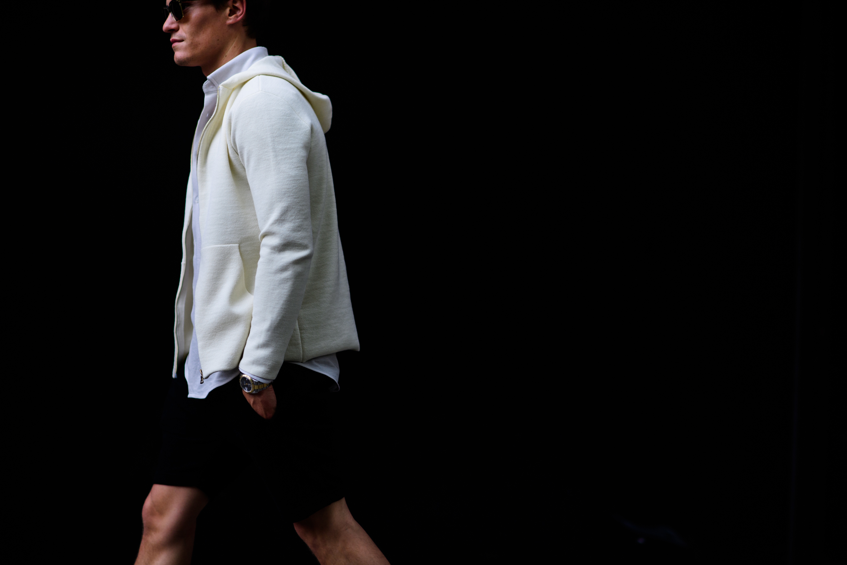 A man wearing beige hoodie