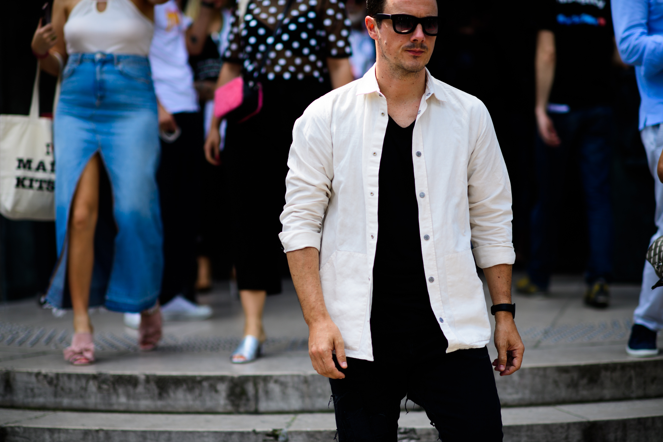 A man in black and a white jacket