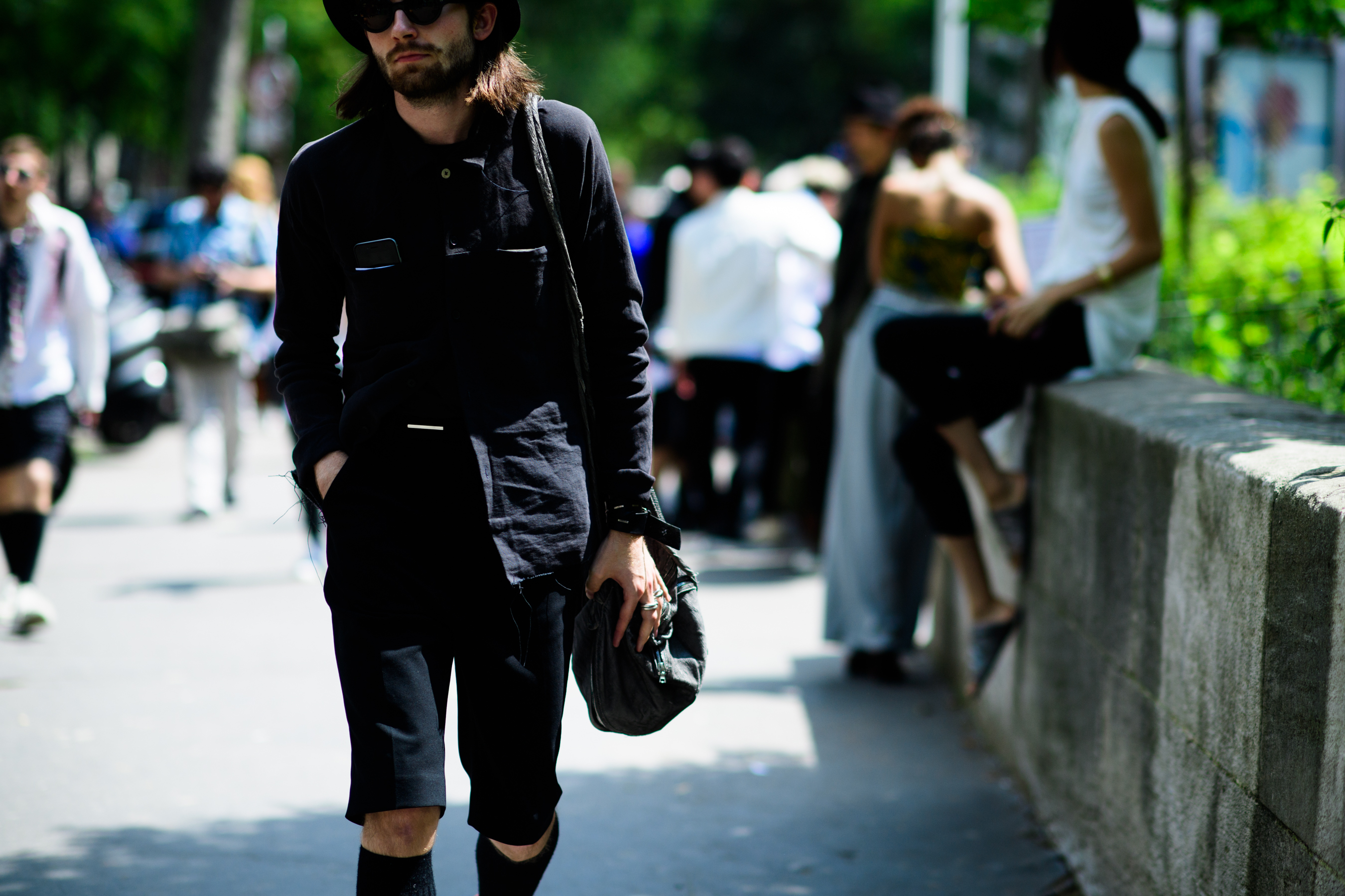 A man wearing a black outfit